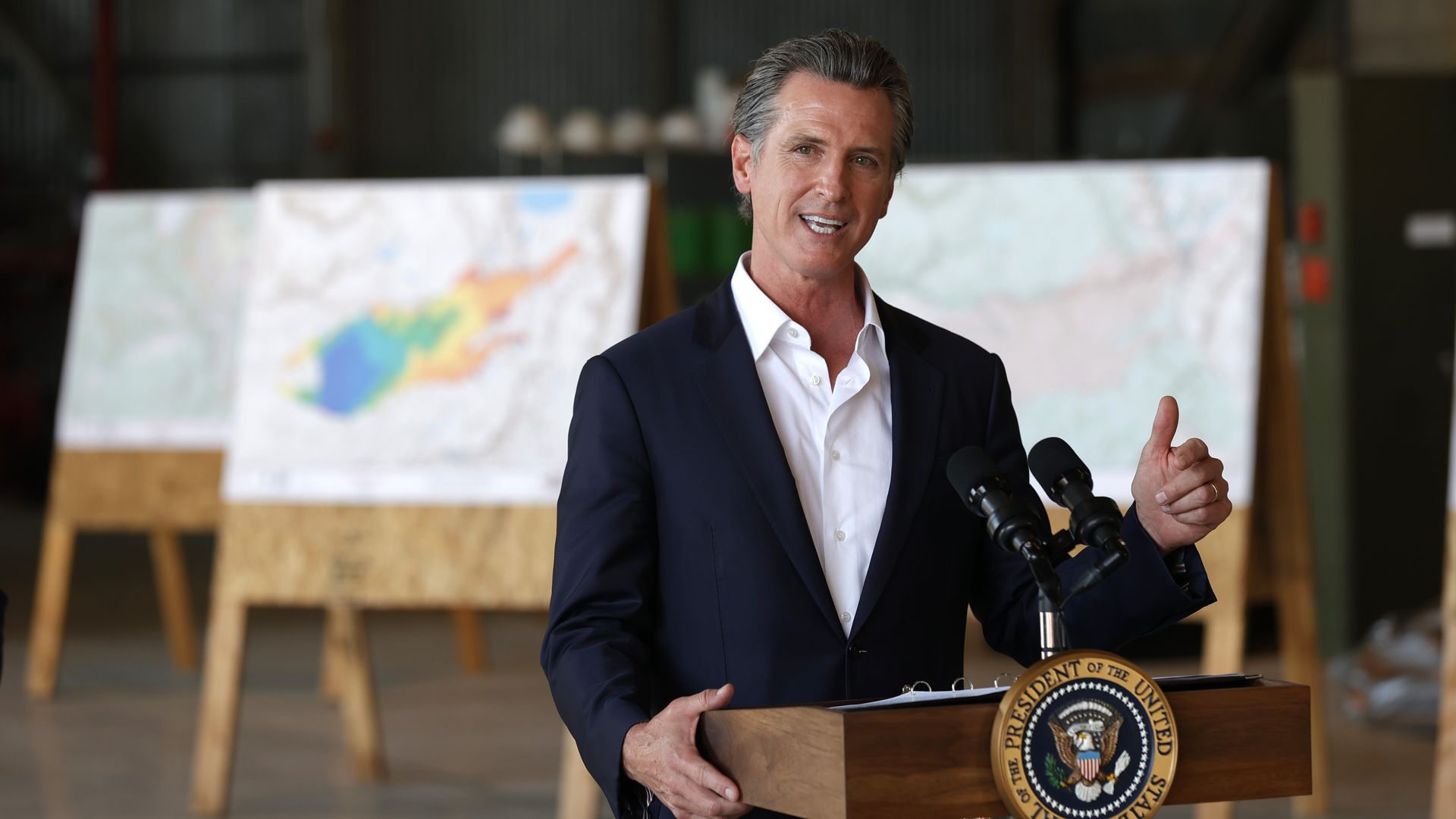 Photo of Gavin Newsom speaking from a podium