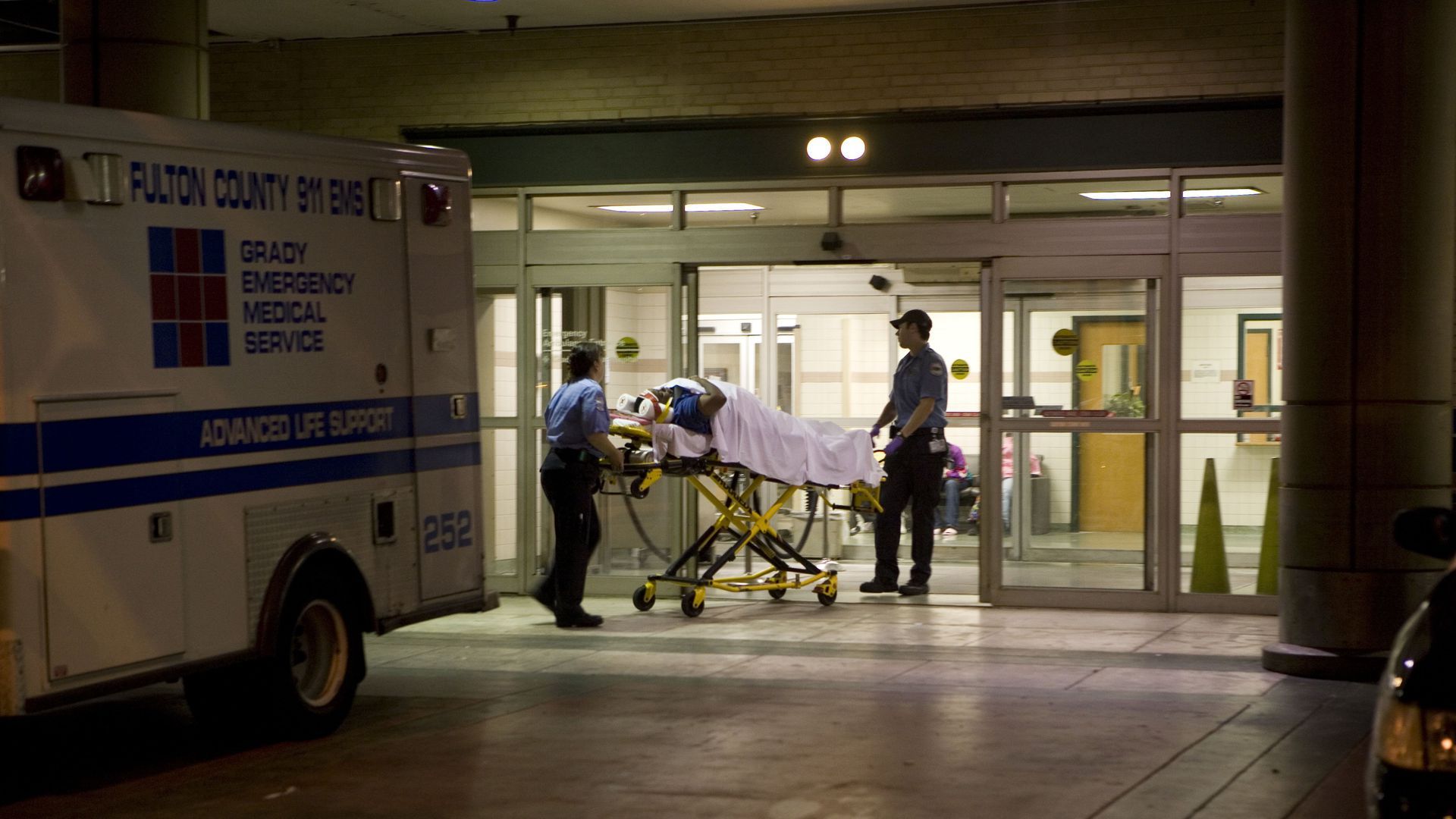 Emergency room stretcher rolling into a hospital