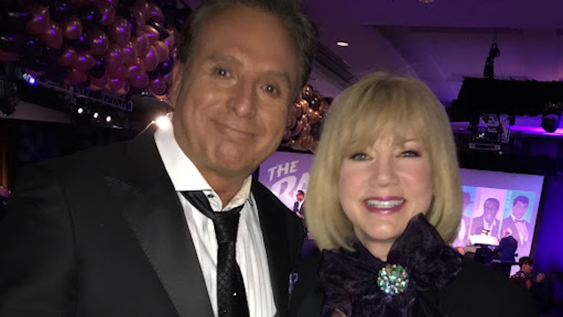 Two people who host tv shows.