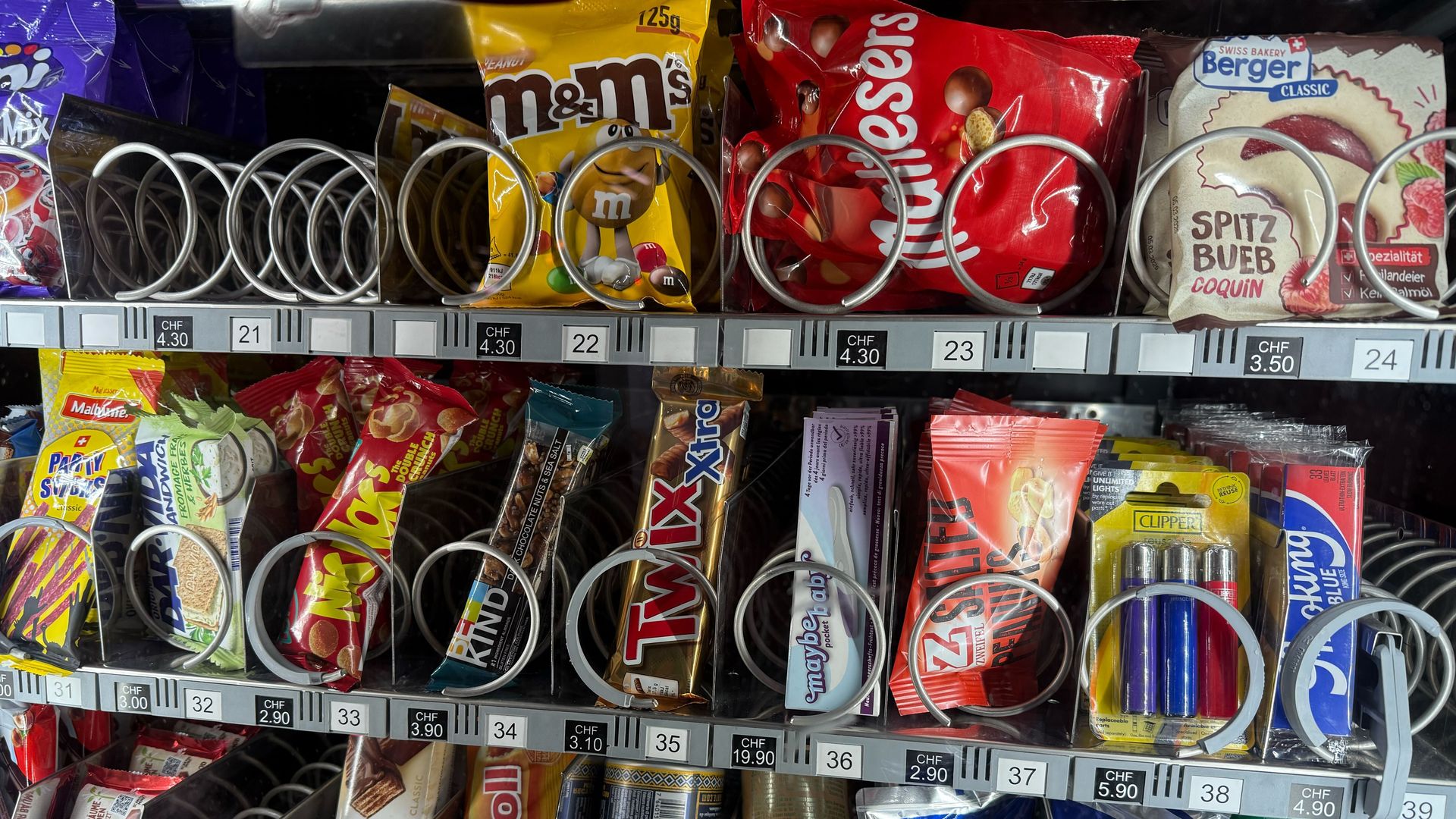 A vending machine with candy and a pregnancy test called "maybe baby." 