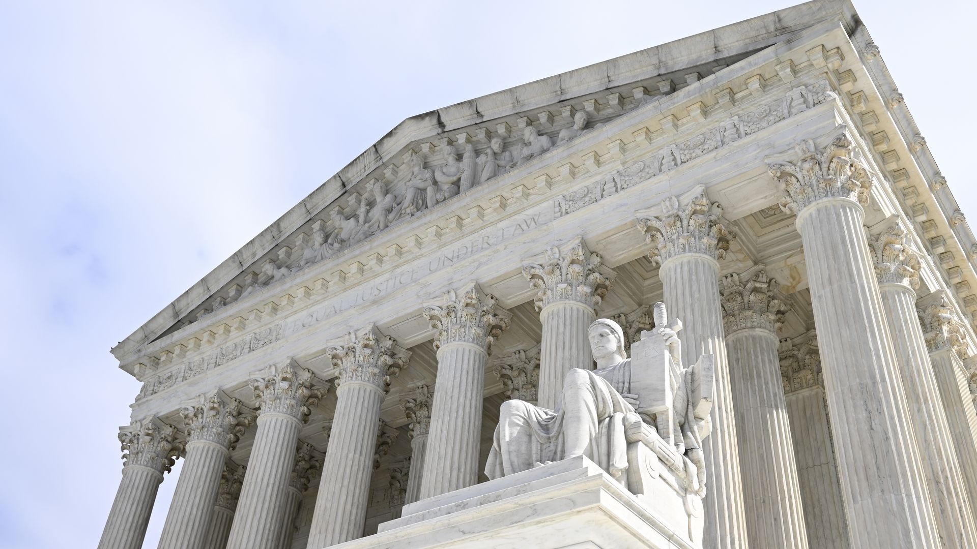 Looking up at the Supreme Court building