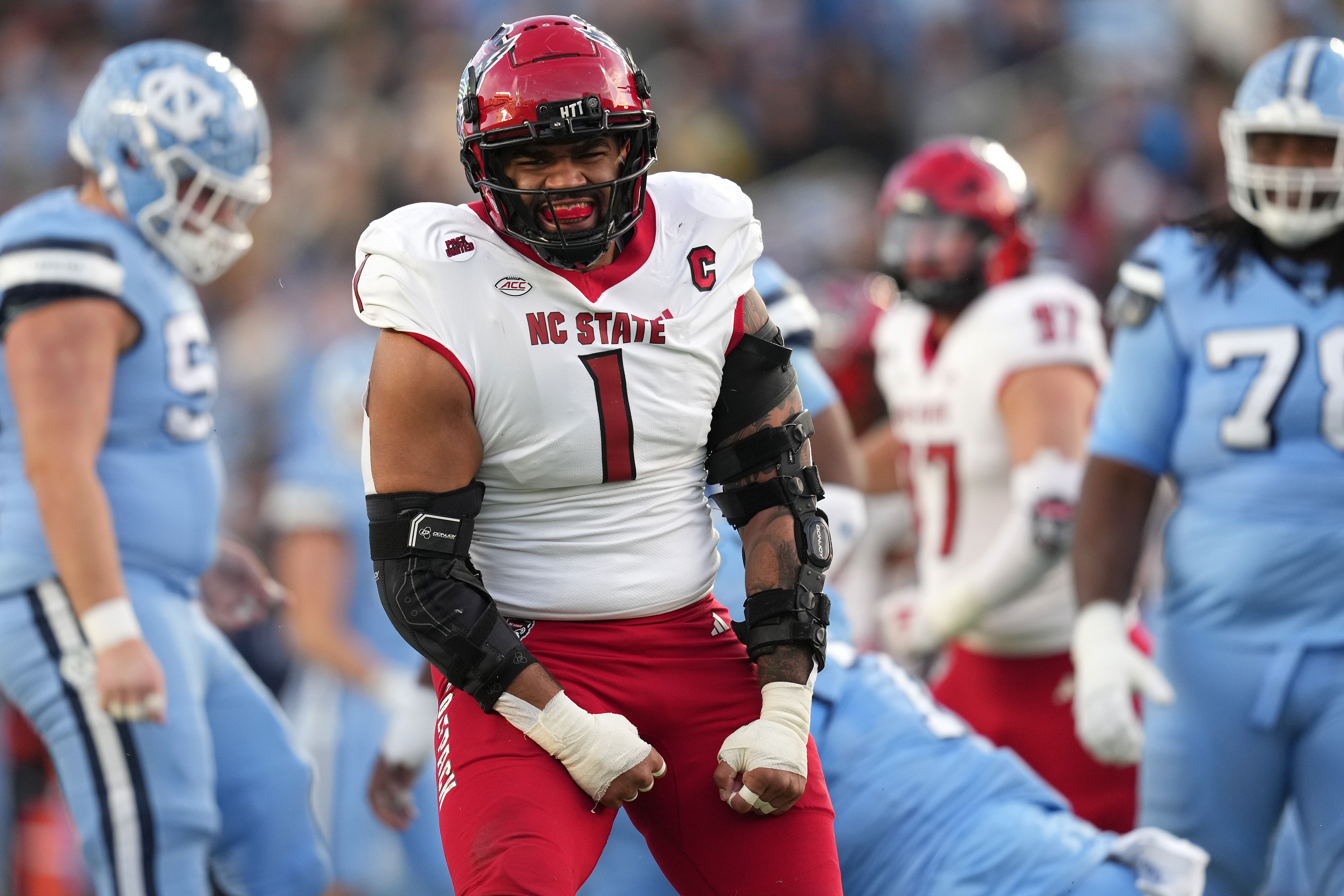 Davin Vann #1 of the North Carolina State Wolfpack reacts during the game against the North Carolina Tar Heels at Kenan Memorial Stadium on November 30, 2024 in Chapel Hill, North Carolina. The Wolfpack won 35-30. (Photo by Grant Halverson/Getty Images)