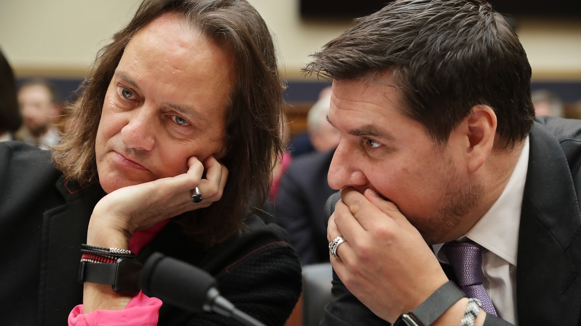 T-Mobile CEO John Legere and Executive Director of Sprint Marcelo Claure talk before testifying to the House Judiciary Committee 