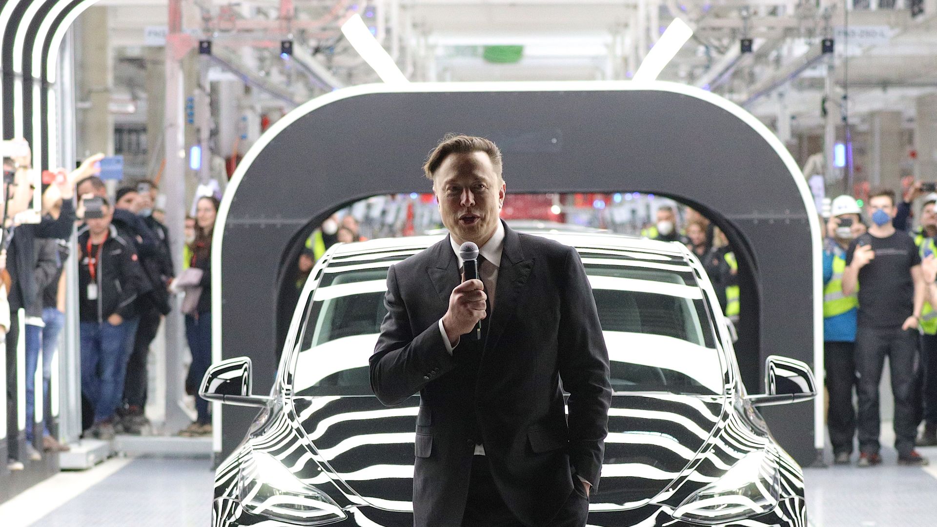 Tesla CEO Elon Musk speaks during the official opening of the new Tesla electric car manufacturing plant on March 22, 2022 near Gruenheide, Germany