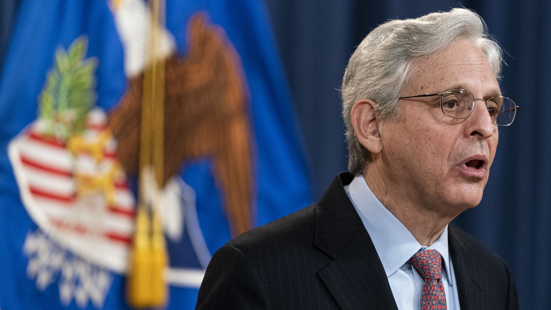 Merrick Garland and a flag
