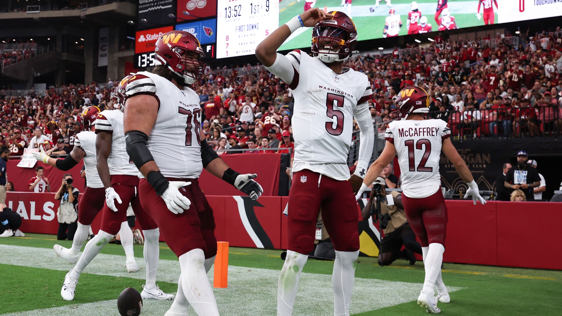 Jayden Daniels celebrates a touchdown 