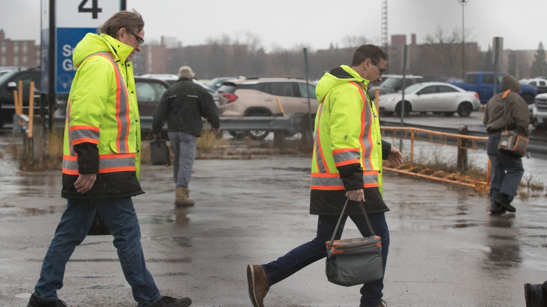 General Motors workers leave the Oshawa General Motors plant in Oshawa, Ontario, on November 26, 2018