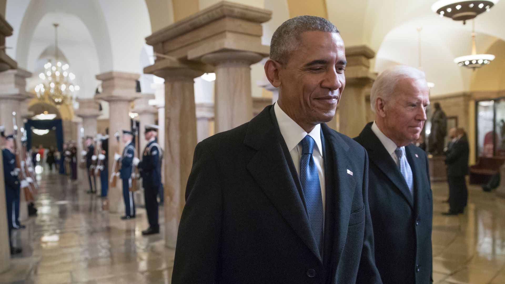 t Barack Obama and Vice President Joe Biden walk through the Crypt of the Capitol