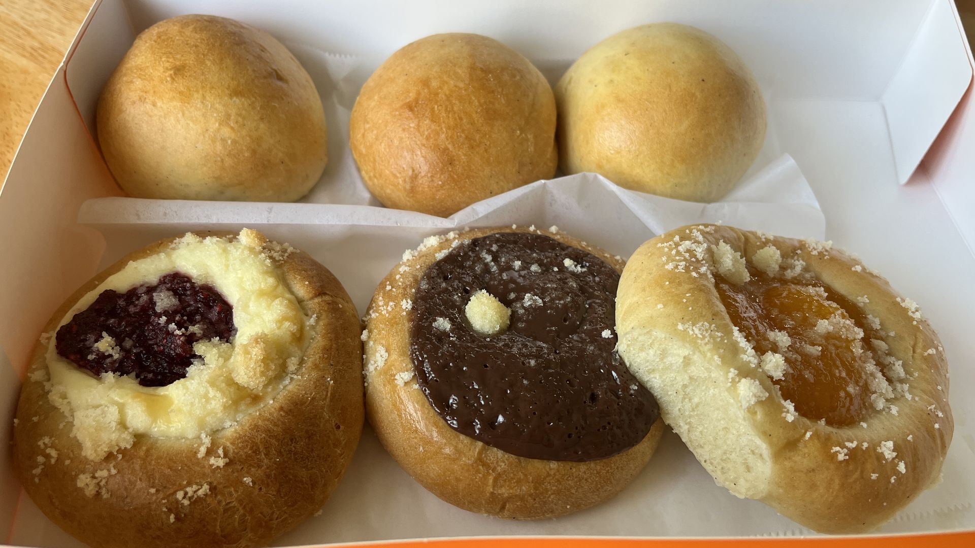 Six pastries in a box.