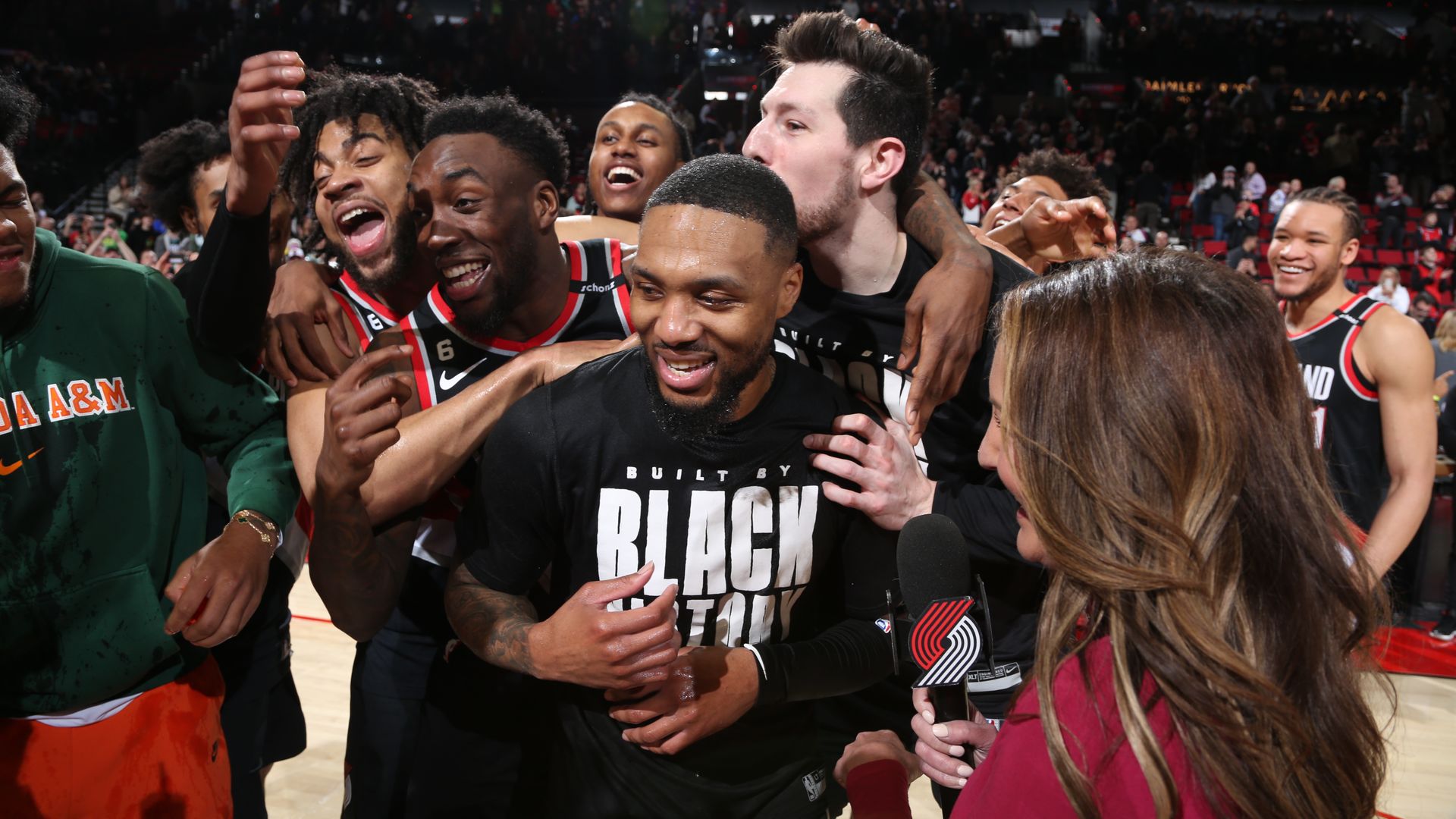 lillard celebrates with teammates