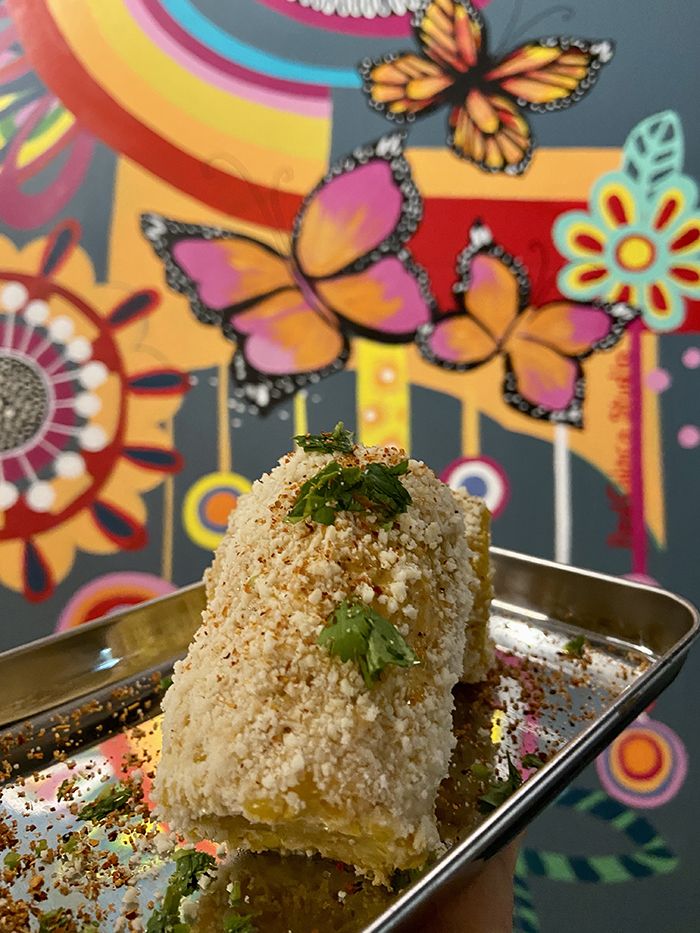 Rolled AF Mexican street corn. Photo: Ashley Mahoney/Axios