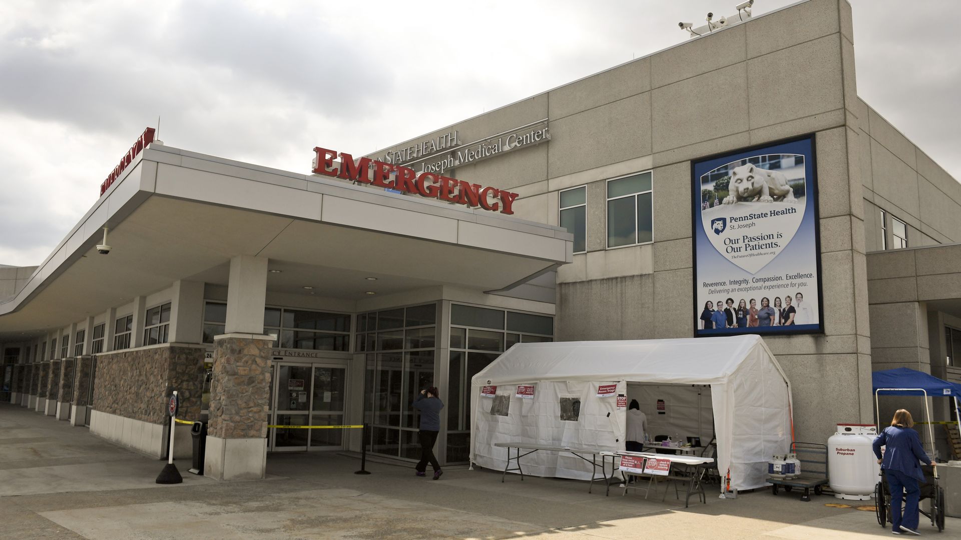 A white coronavirus testing tent outside of a hospital emergency room.