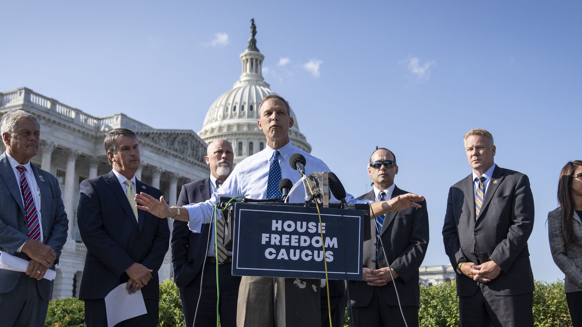 Rep. Scott Perry and other Freedom Caucus members at a press conference outside the Capitol. 