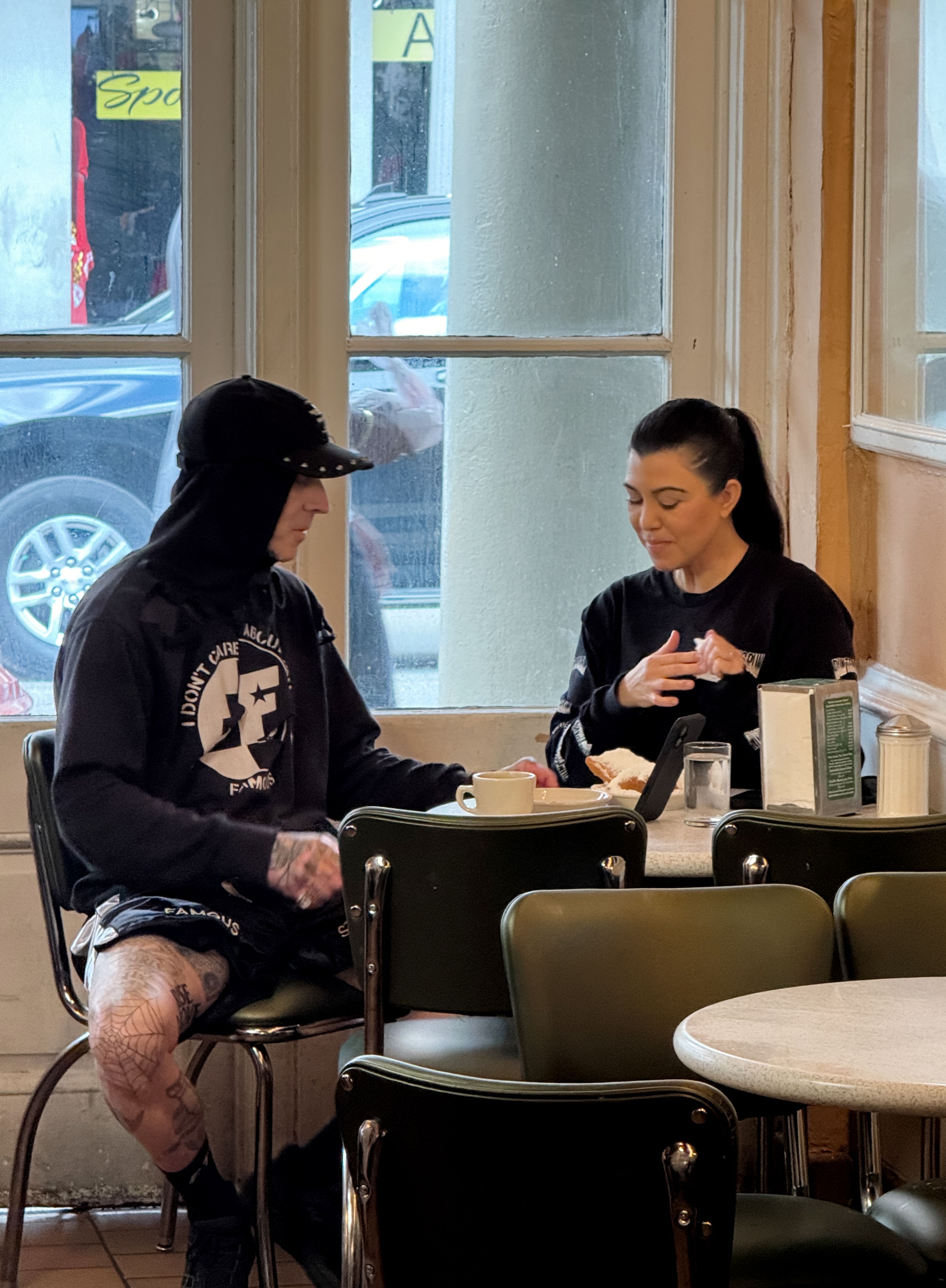 Photo shows Travis Barker and Kourtney Kardashian.