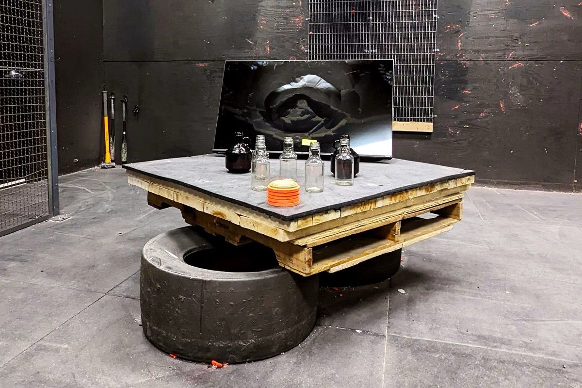 A TV, glass bottles and more on display. 