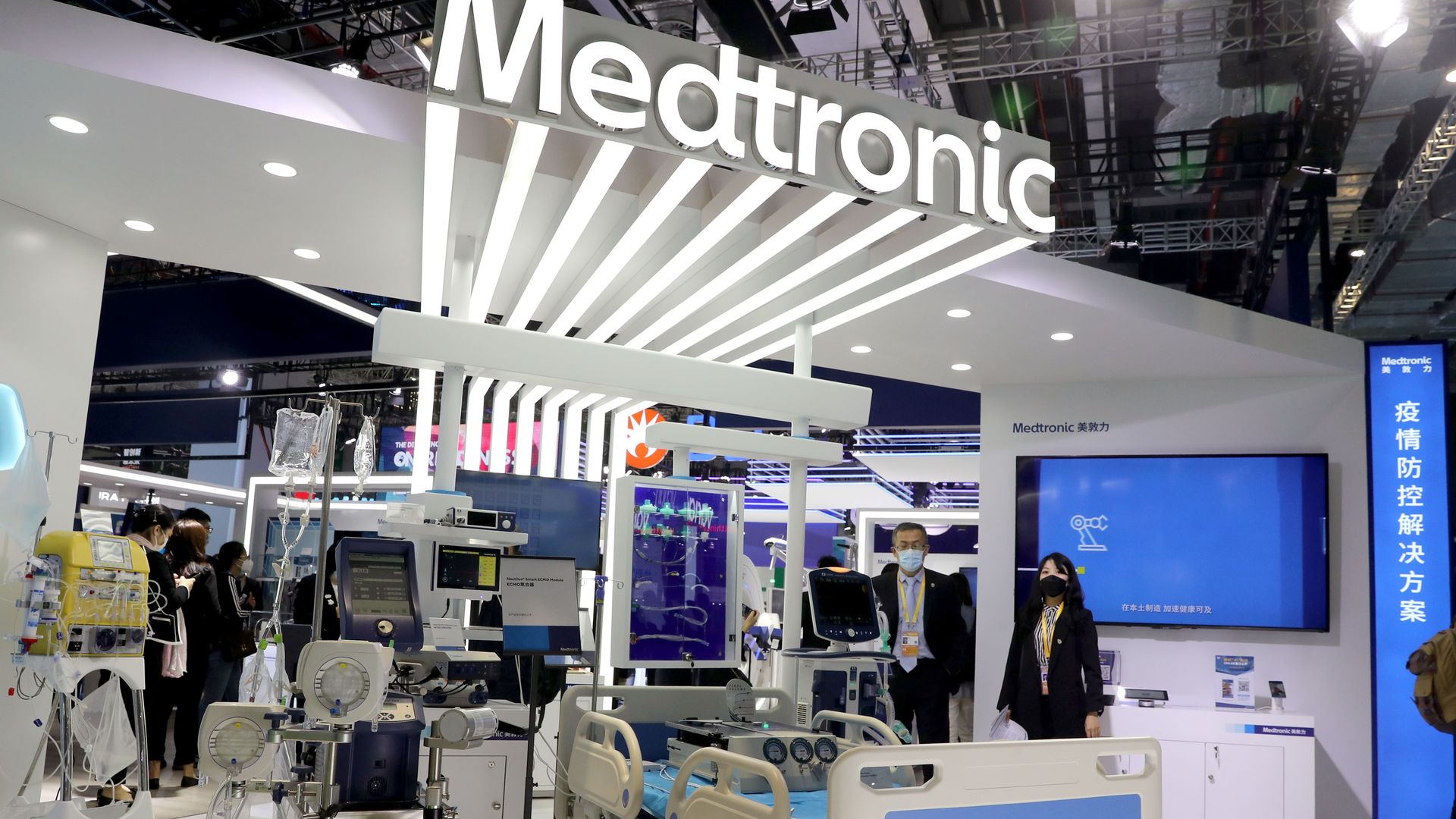 The Medtronic logo sits above a display of its medical devices and products at a trade show.