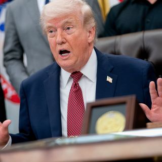 US takes Iran-flagged ship into custody, Trump says