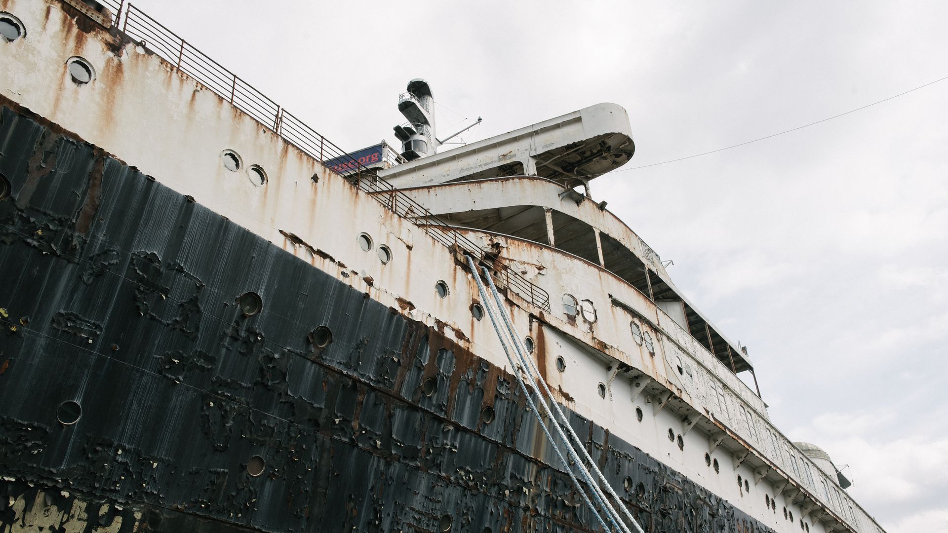 The rusted exterior of the retired SS United States ocean liner.