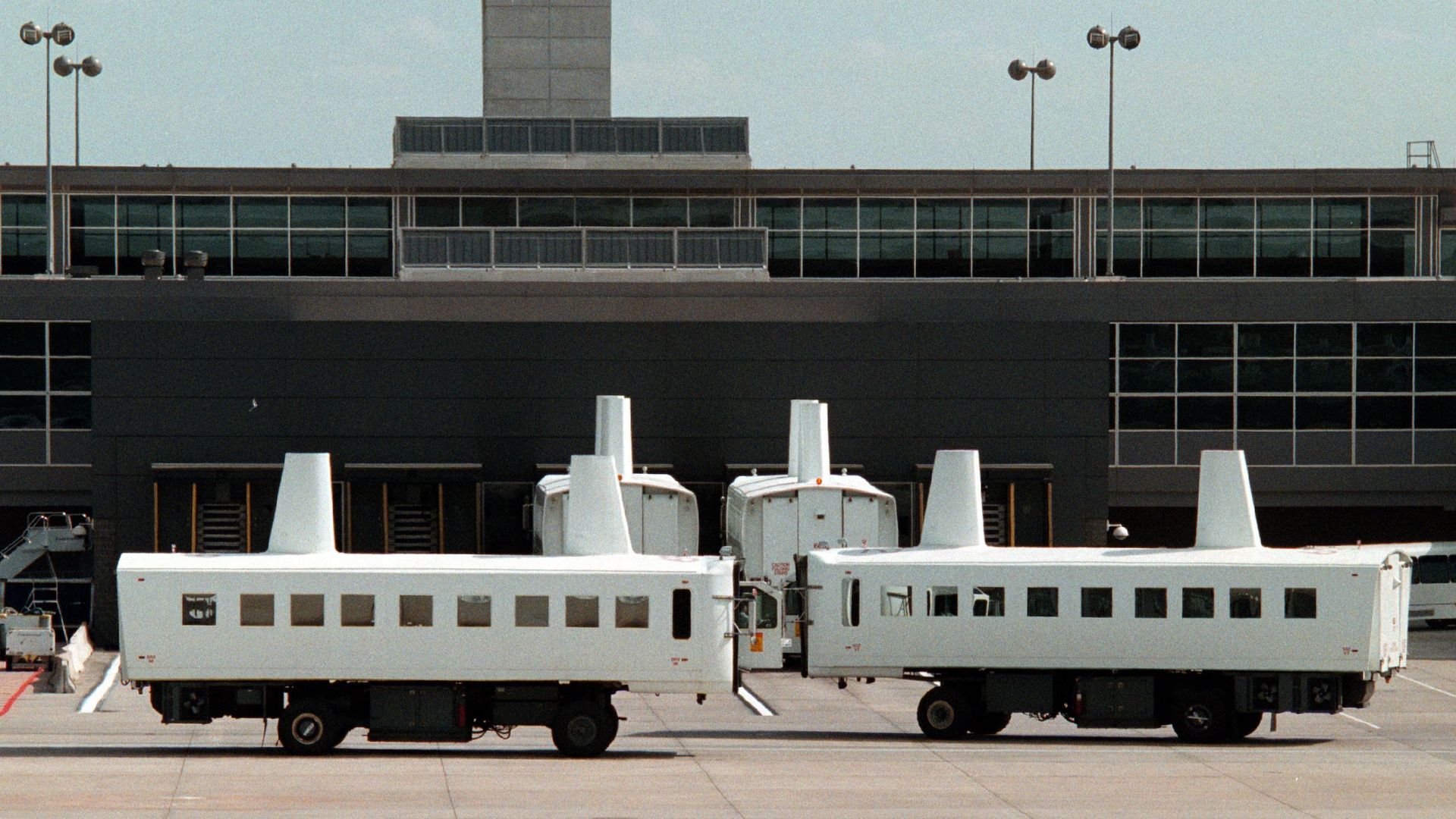 An exterior view of the "people mover" mobile lounges at Dulles Airport