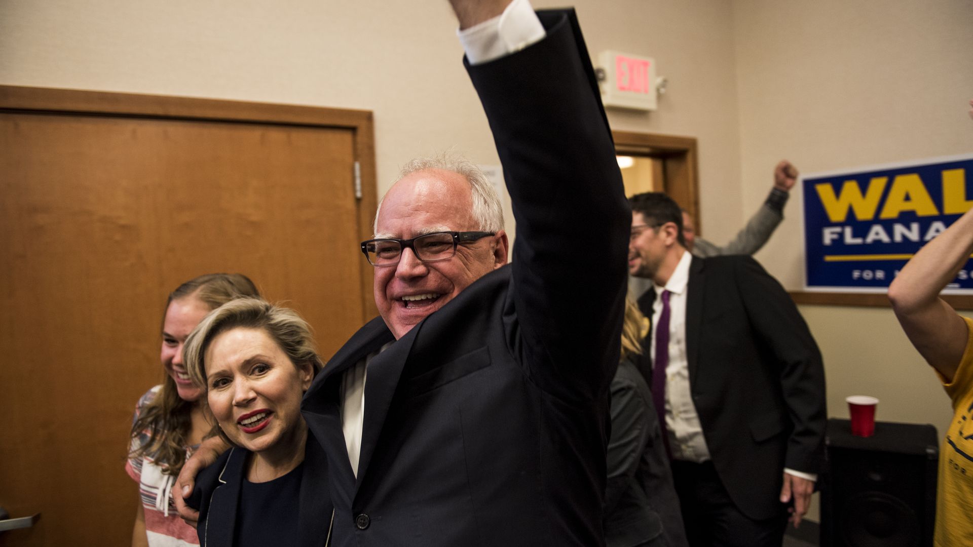 Rep. Tim Walz (D-MN) and his wife, Gwen Walz, celebrate while entering his election night party on August 14, 2018 in St Paul, Minnesota. Walz won the night's primary and will go on to be the DFL candidate for Governor in the general election. (Photo by Stephen Maturen/Getty Images)