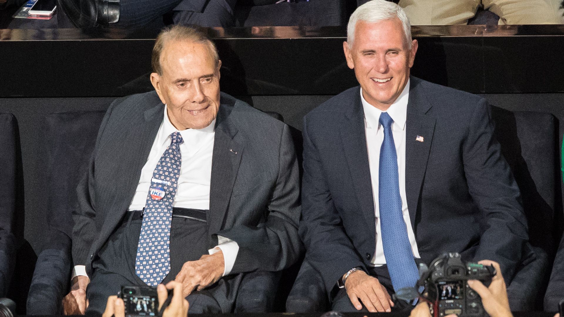 Former Senator Bob Dole sits next to Mike Pence at the 2016 Republican National Convention.