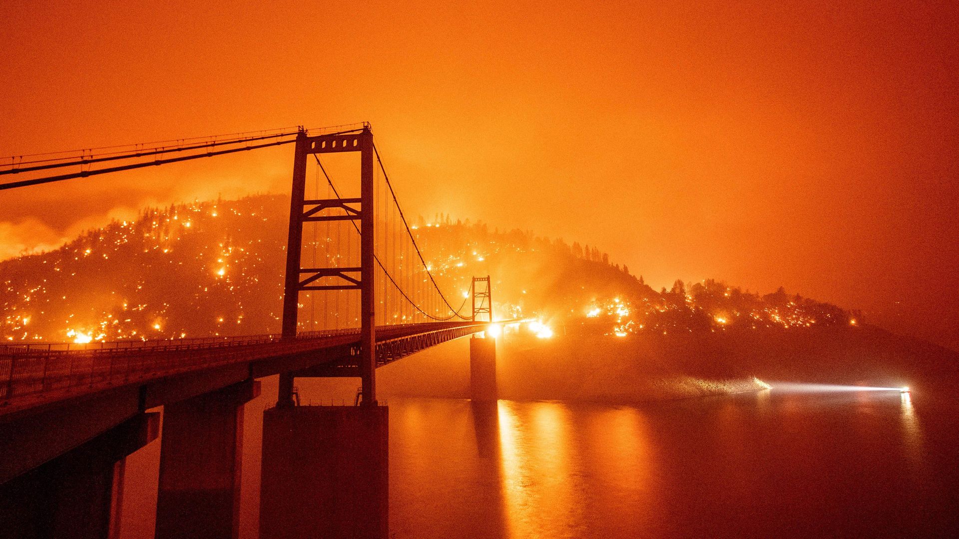 Bidwell Bar Bridge surrounded by fire during the Bear fire in Oroville, Calif. on September 9, 2020.