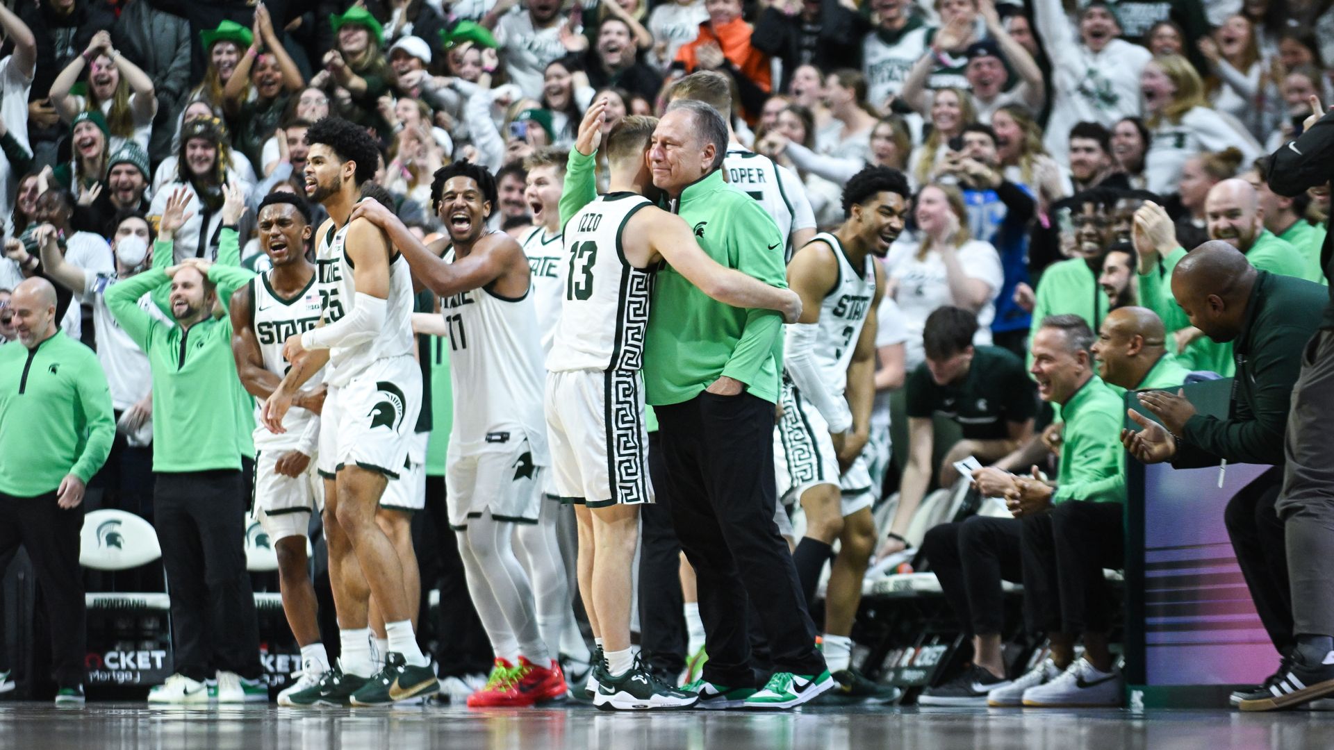 Steven and Tom Izzo hug after Steven's first career field goal against Rutgers in January. Photo: Adam Ruff/Icon Sportswire via Getty Images