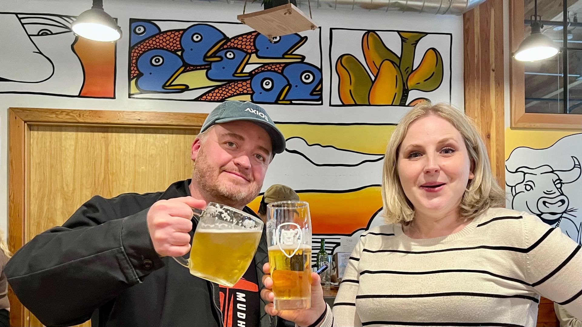 Lewis and Melissa cheers beers