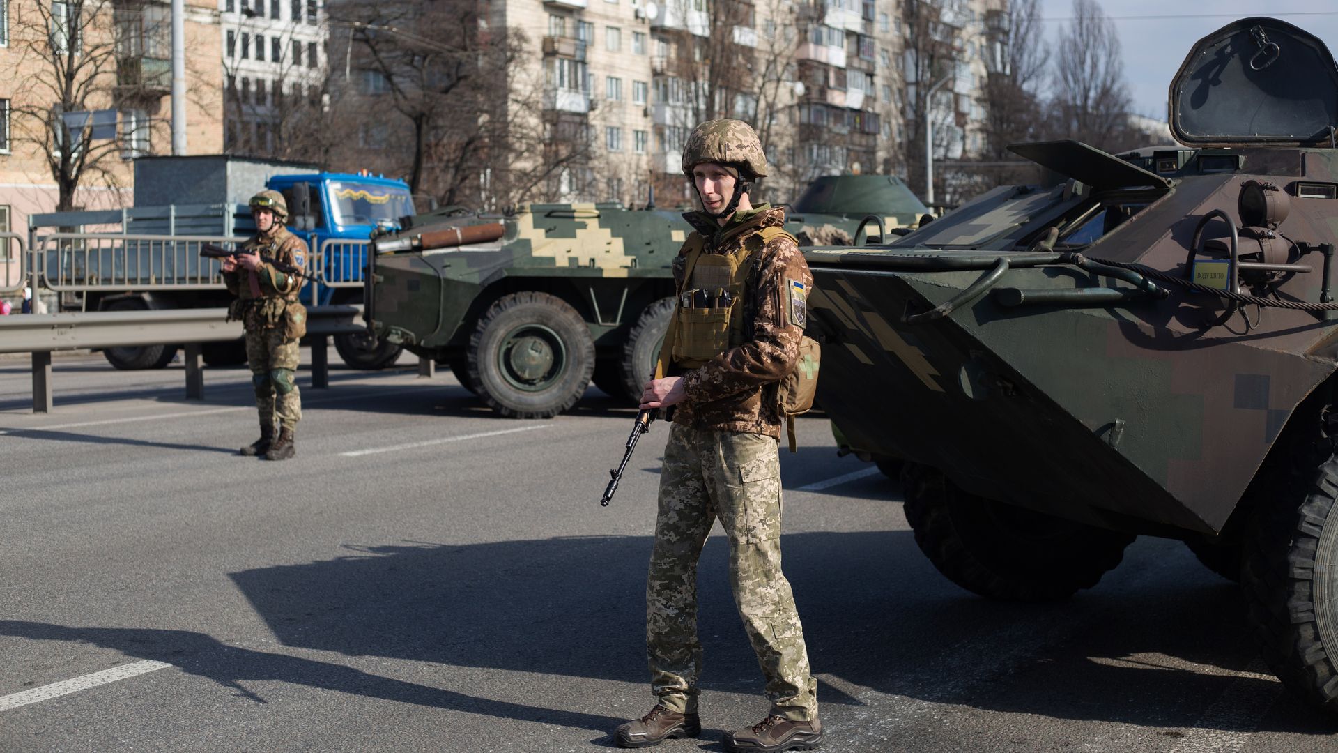 Ukrainian servicemen stand on patrol at a security checkpoint on February 25, 2022 in Kyiv, Ukraine. 