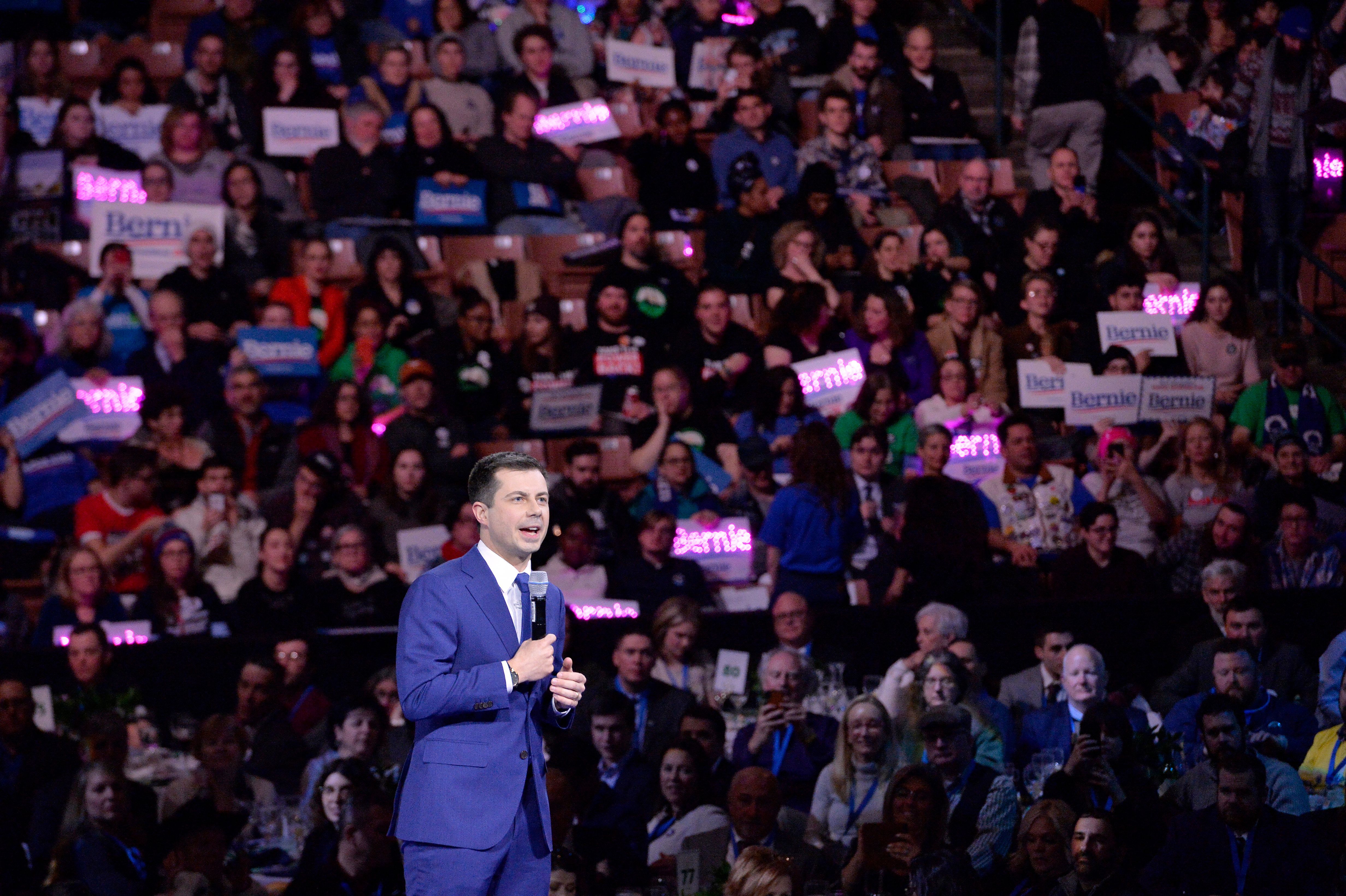 ormer Mayor of South Bend, Indiana, Pete Buttigieg addresses the Democratic Party's 61st Annual McIntyre-Shaheen 100 Club dinner at SNHU arena in Manchester, New Hampshire, on February 8