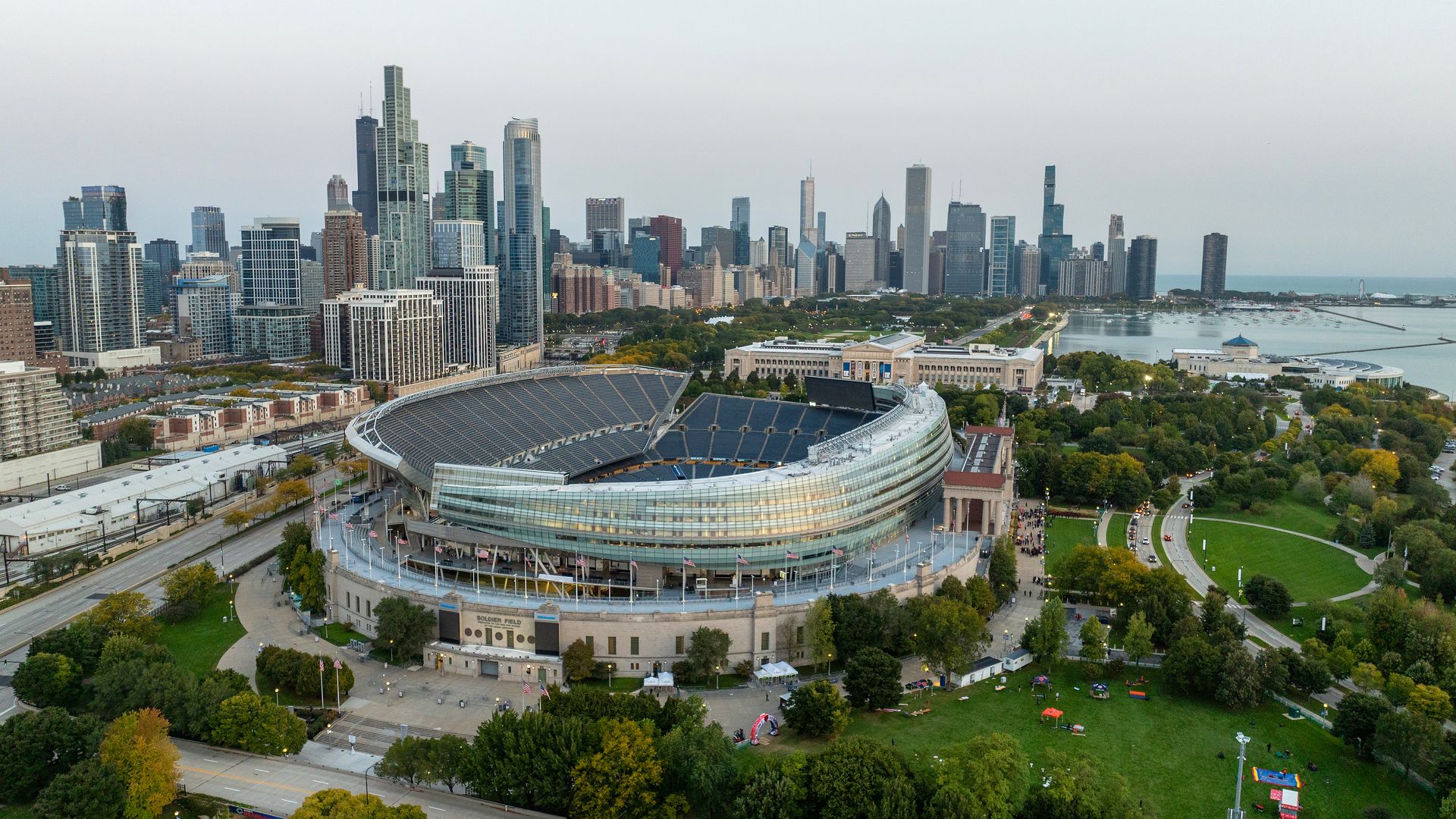 Photo of a stadium with a city skyline in the backdrop 
