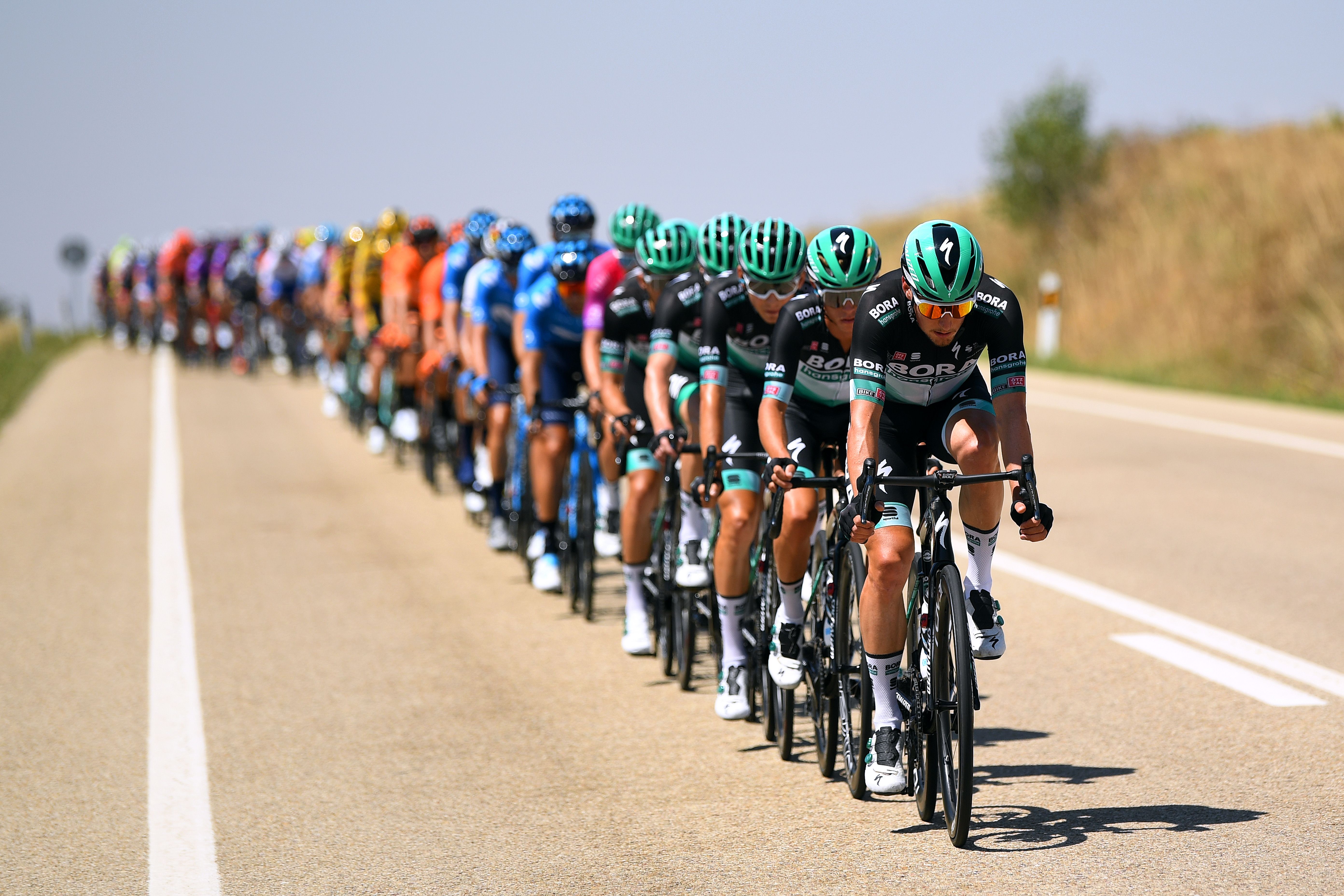 peloton of a cycling race in spain