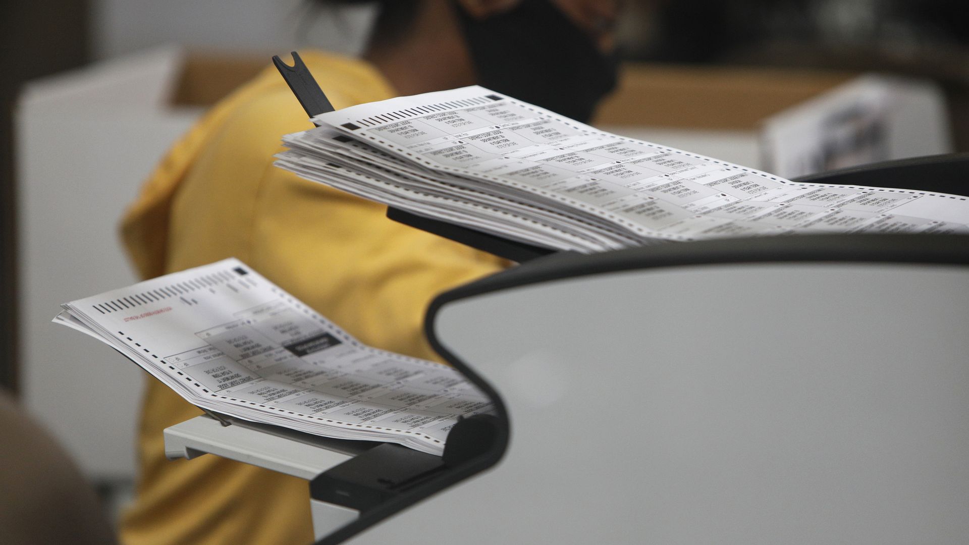 Picture of ballots being processed