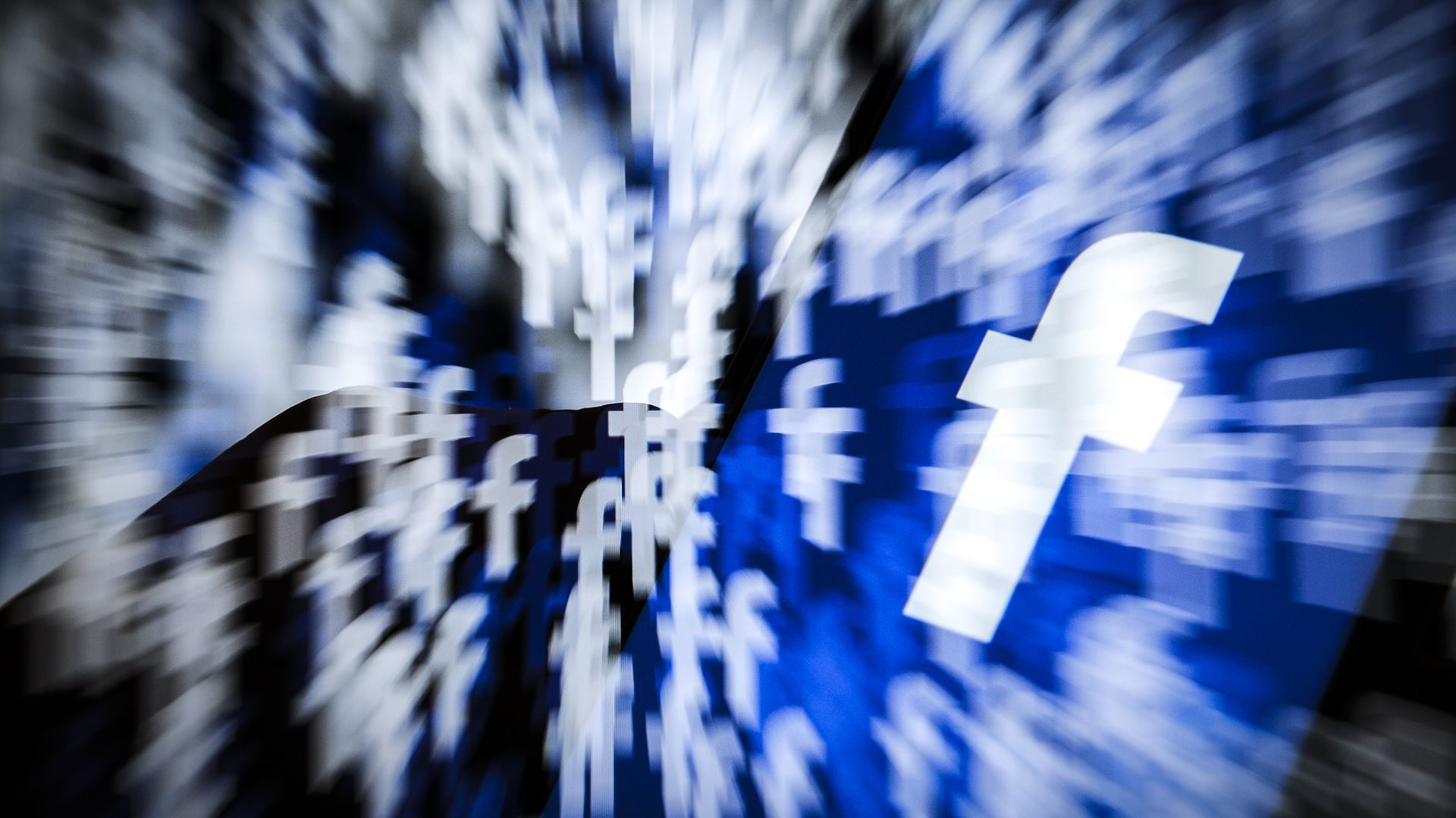 Photo illustration of Facebook logo