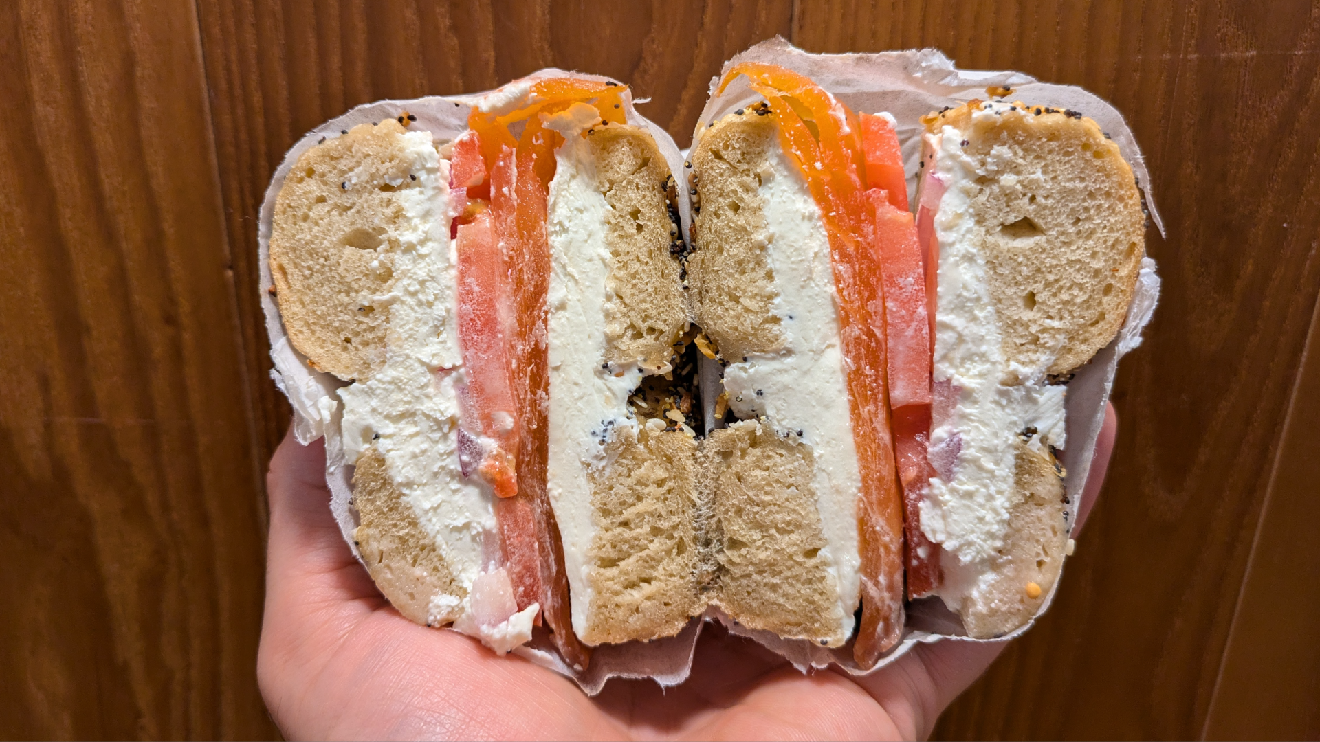 An everything bagel with lox and cream cheese