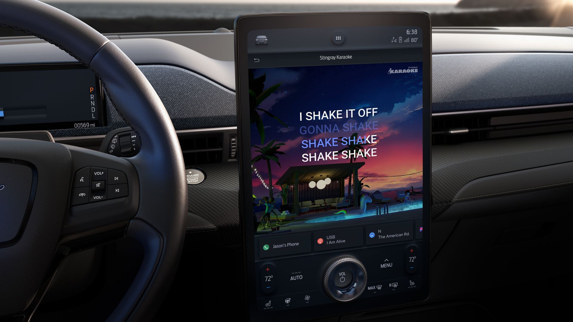 An infotainment display in a car displaying the lyrics to "shake it off"