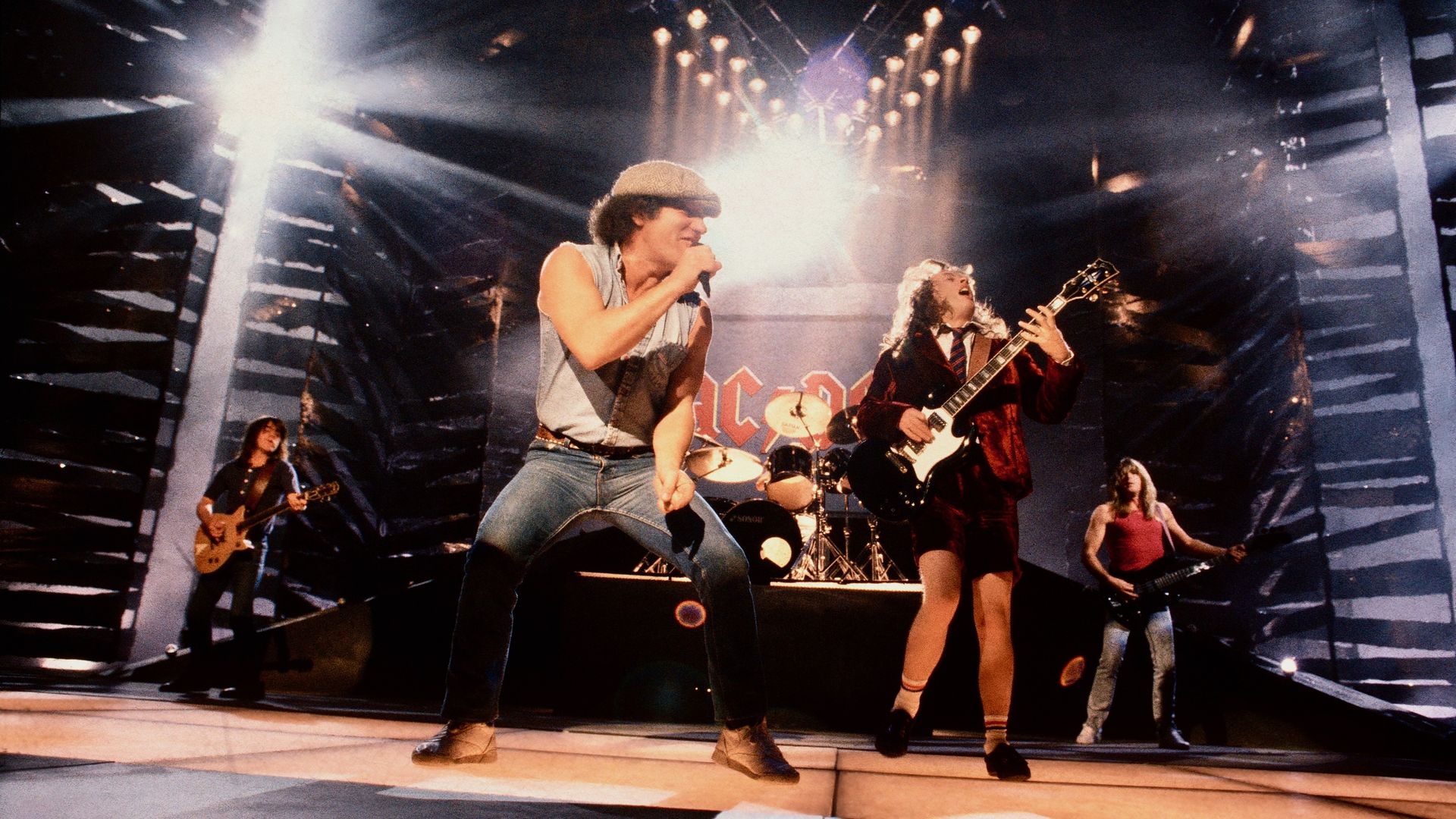 The members of rock band AC/DC perform on stage. 