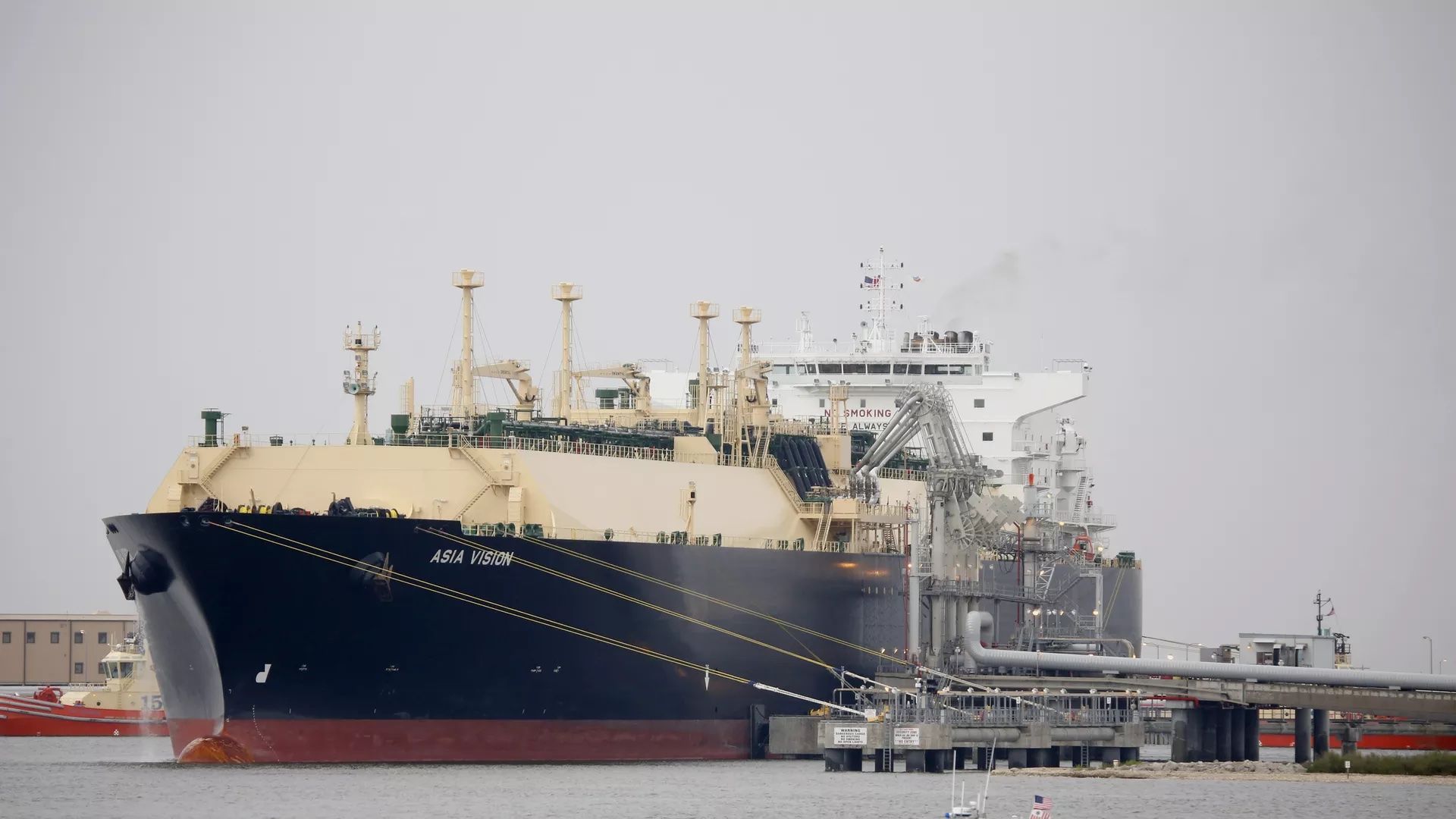 The Asia Vision LNG carrier ship docked at a terminal in Sabine Pass, Texas