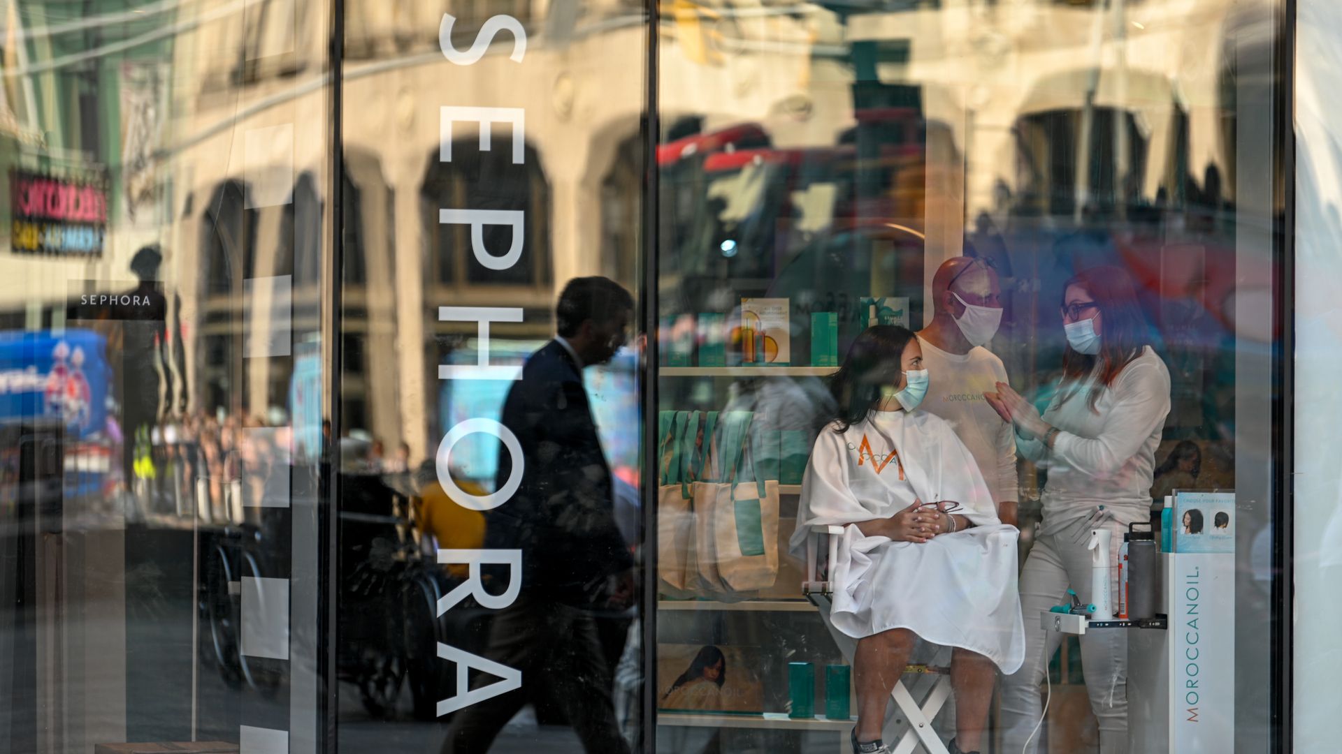 A customer gets a makeover at a Sephora store in Times Square.