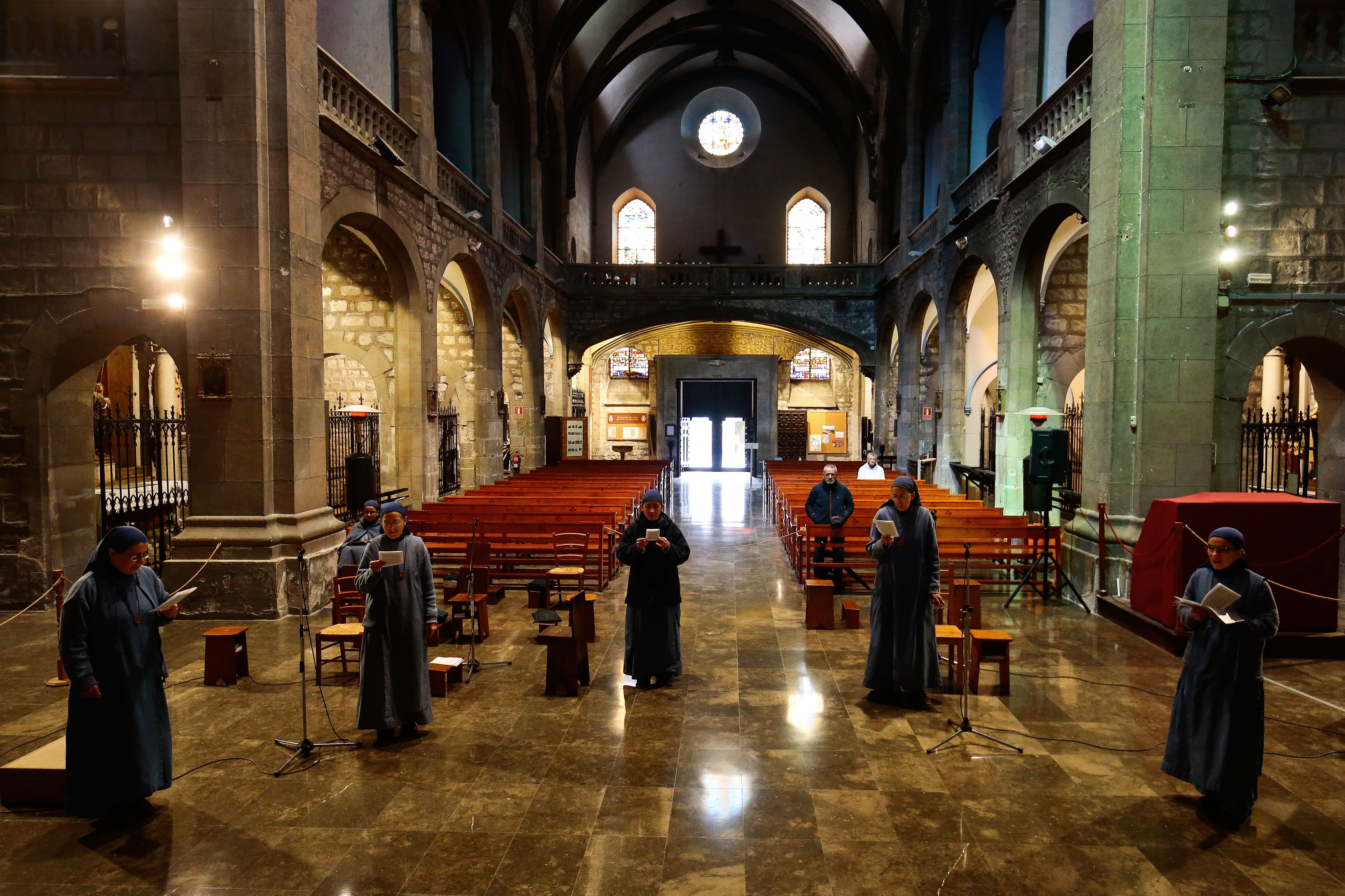 Nuns sing in an almost empty church in Barcelona on March 29