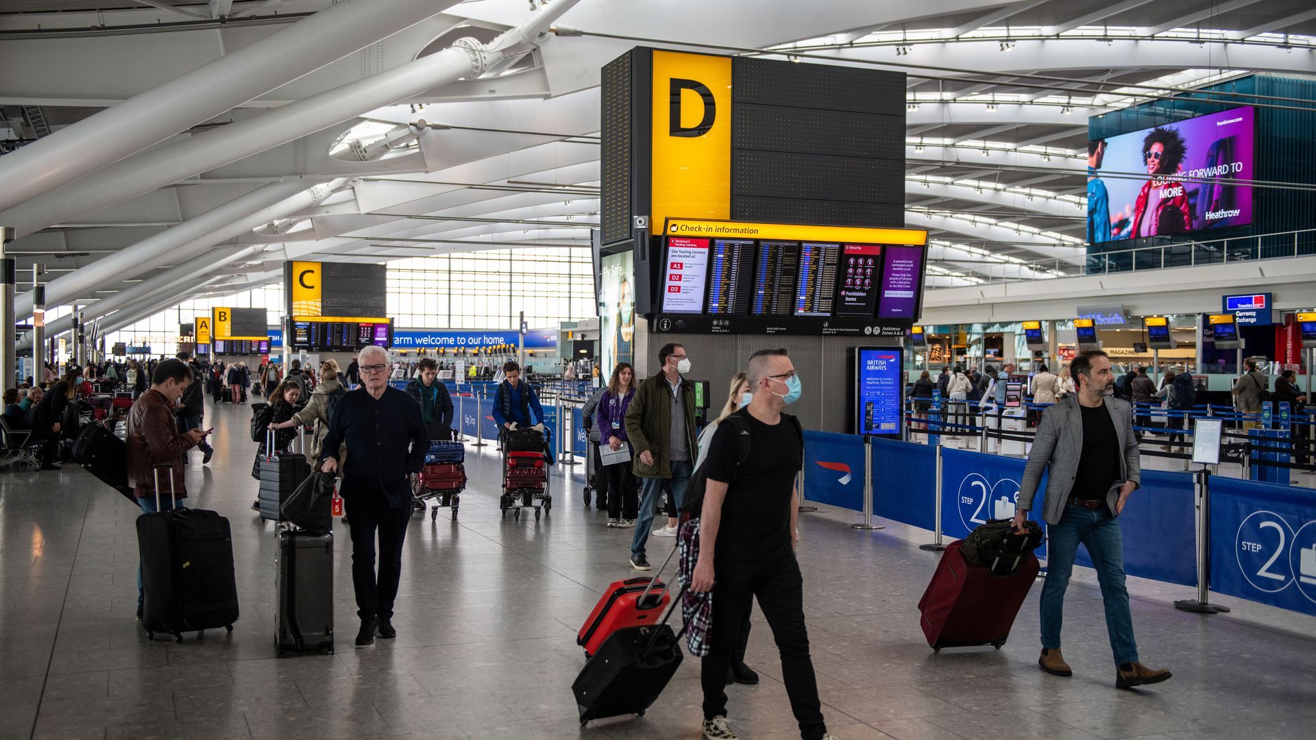 Passengers in the departures hall of Terminal 5 at London Heathrow Airport on April 13. 