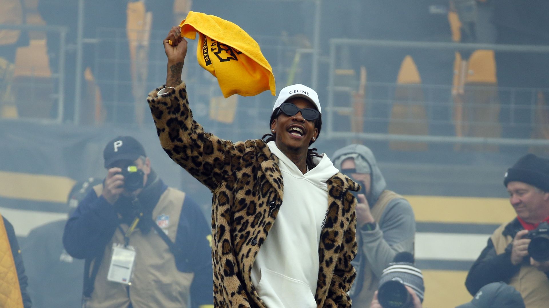 Wiz Khalifa waves a terrible towel before the game between the Baltimore Ravens and the Pittsburgh Steelers on December 11, 2022 at Acrisure Stadium in Pittsburgh, Pennsylvania. (Photo by Justin K. Aller/Getty Images)