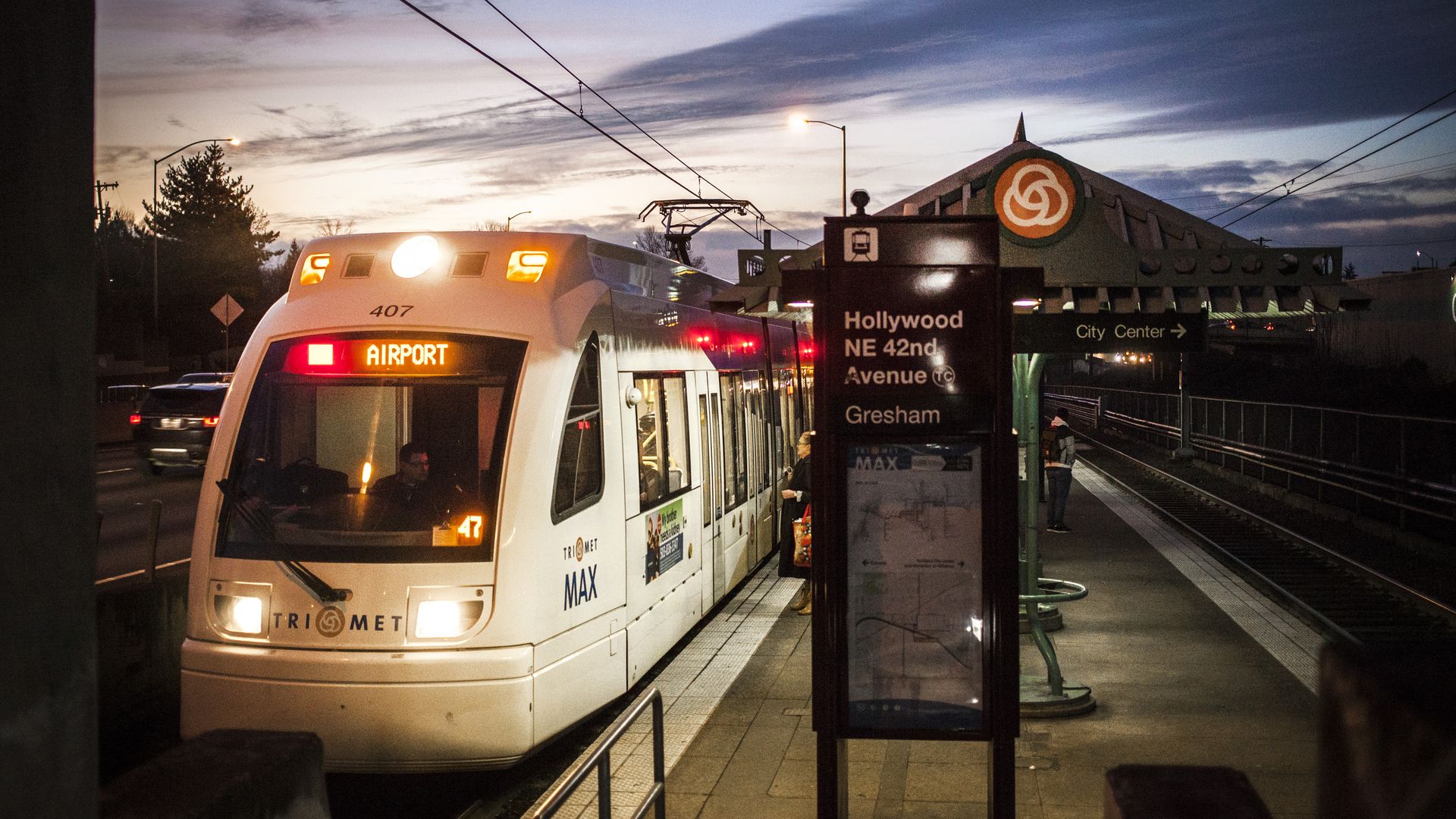 A TriMet MAX train at dusk at the Hollywood station in Portland 