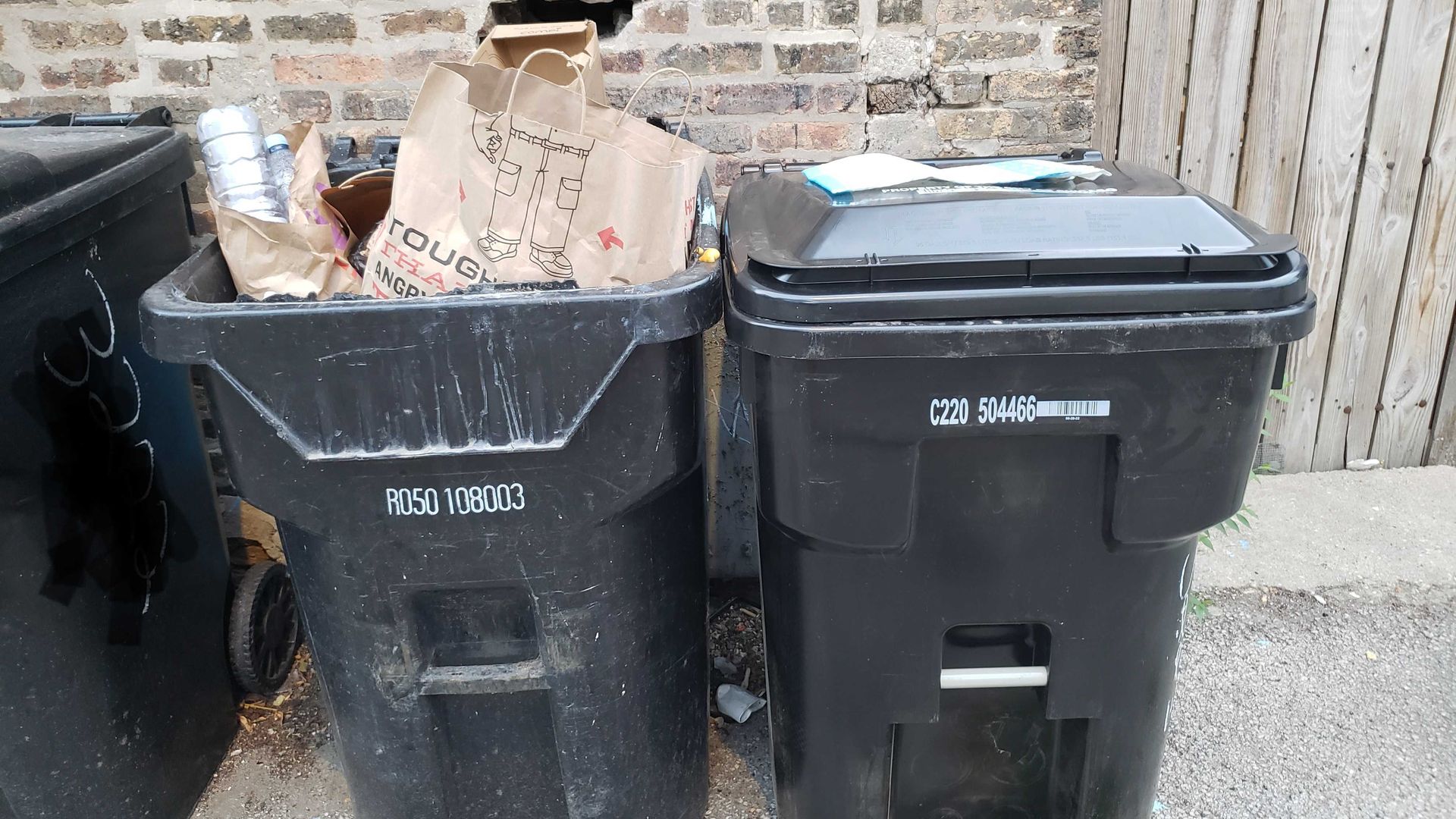 Photo of garbage cans in an alley
