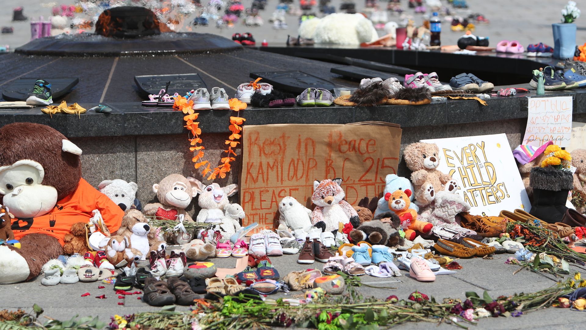 A memorial around the Centennial Flame on Parliament Hill in Ottawa, Ontario, Canada, on Friday, June 4