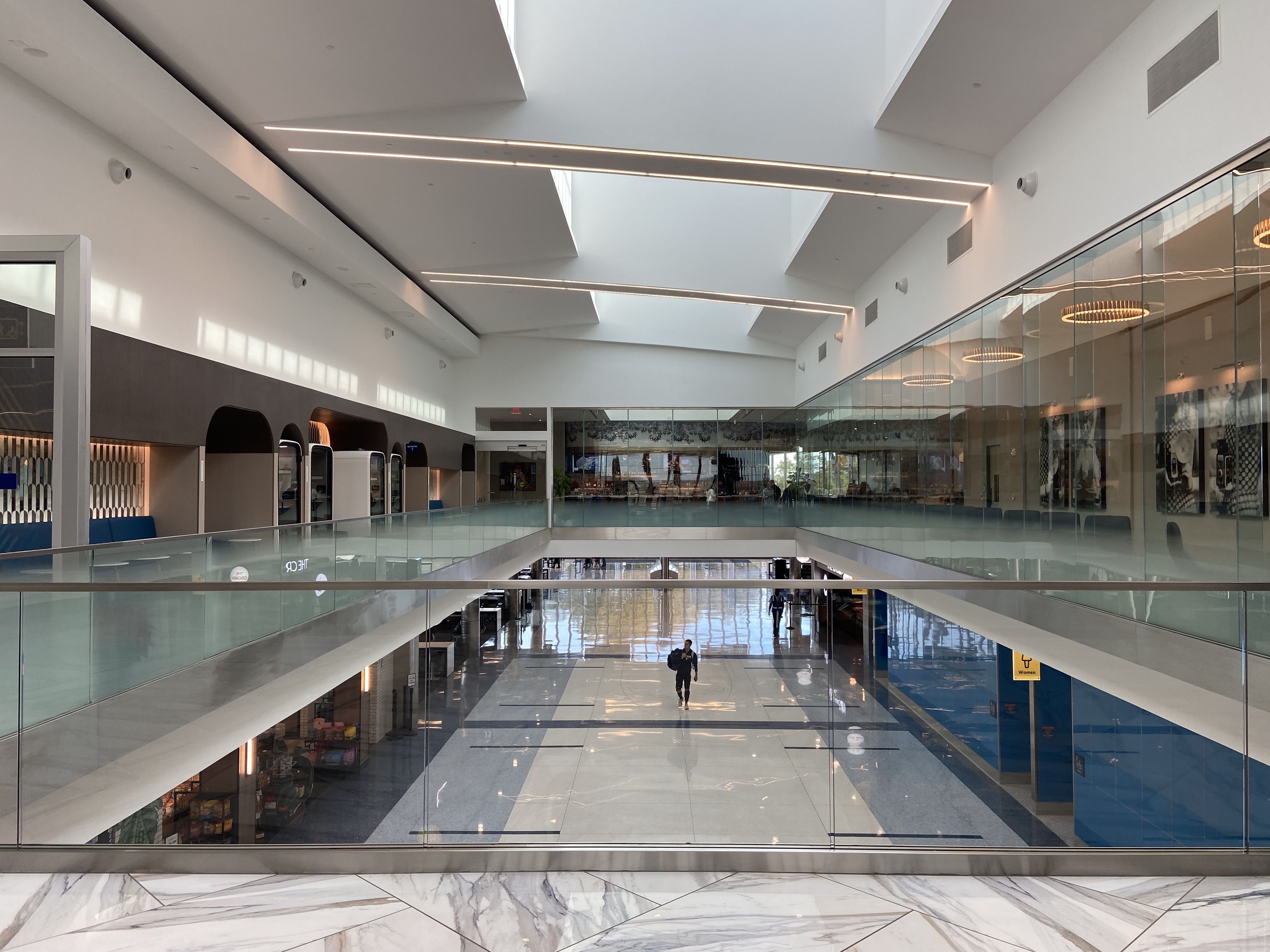 The view of the lounge as reach the top of the escalator. 