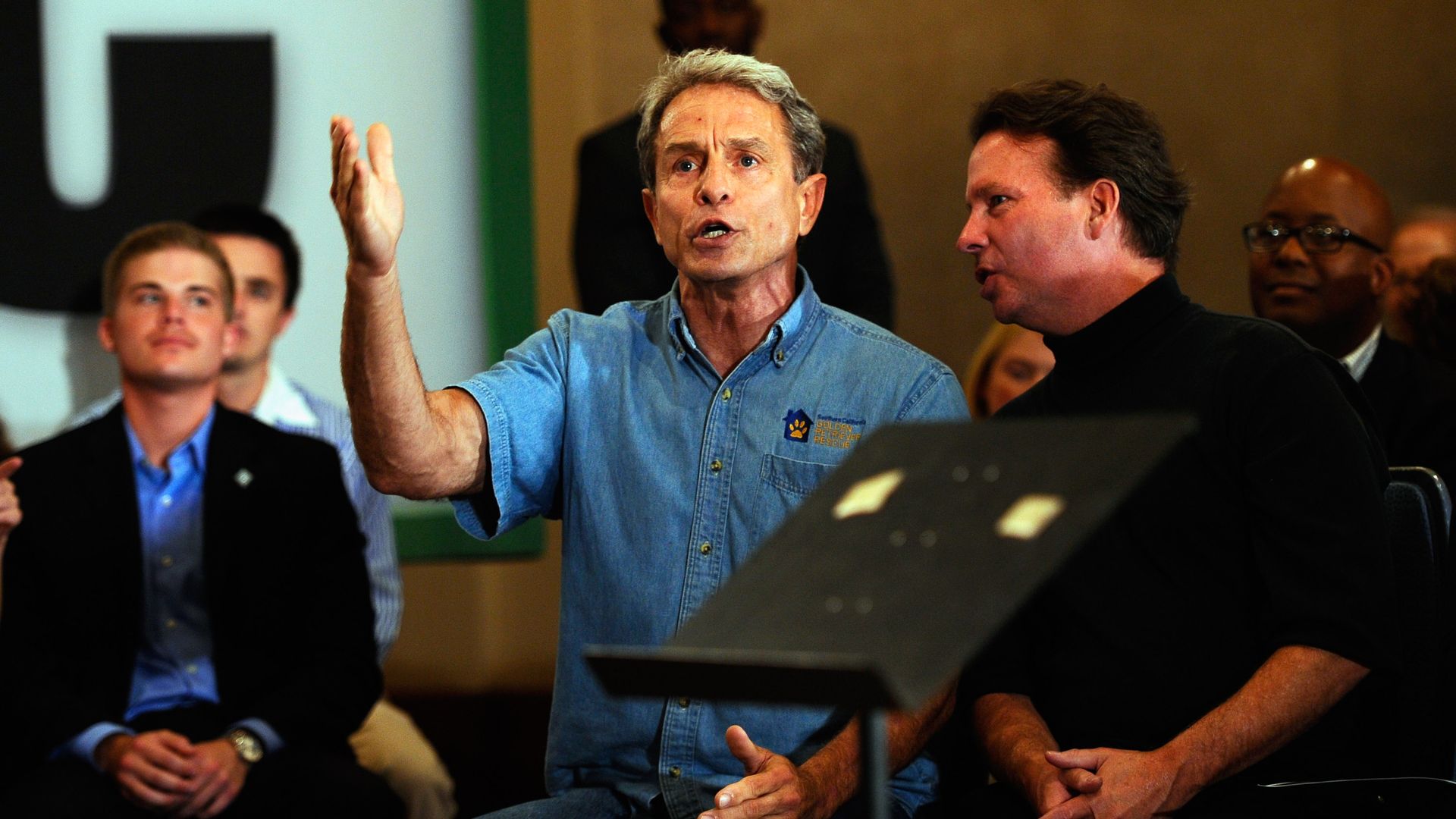 Ed Buck (C) interrupts California Republican Party gubernatorial candidate Meg Whitman's campaign event on September 22, 2010