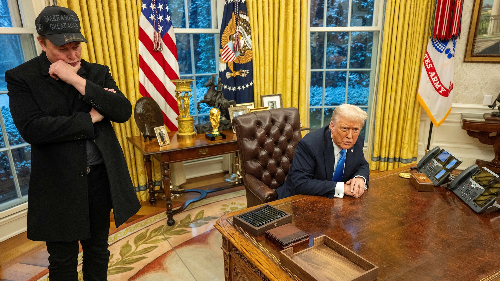  Elon Musk listens as US President Donald Trump speaks in the Oval Office of the White House in Washington, DC, on February 11, 2025. 