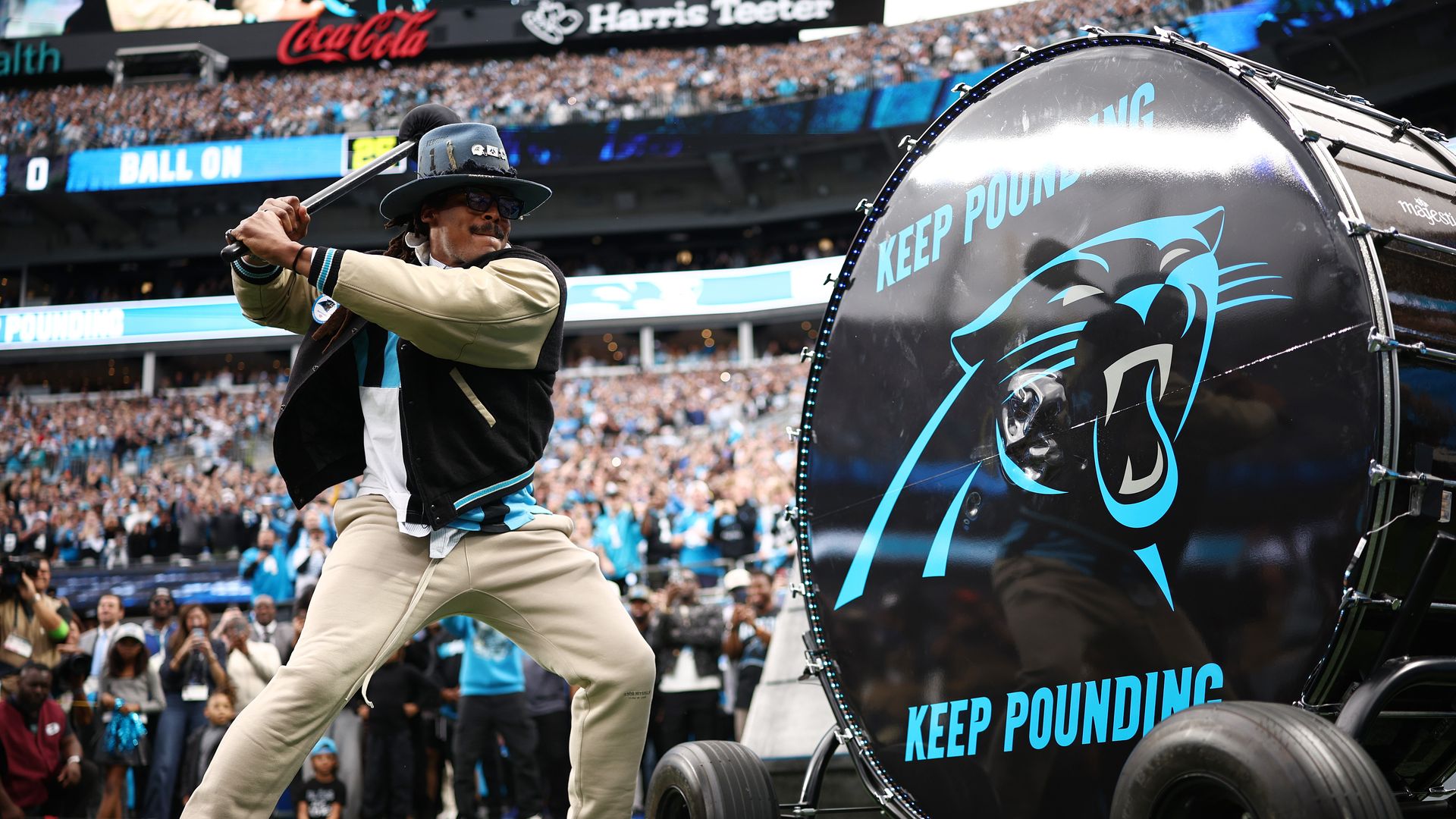 Former quarterback Cam Newton bangs the drum prior to the NFC Wild Card Playoff game between the Los Angeles Rams and the Carolina Panthers at Bank of America Stadium on January 10, 2026 in Charlotte, North Carolina. (Photo by Jared C. Tilton/Getty Images)