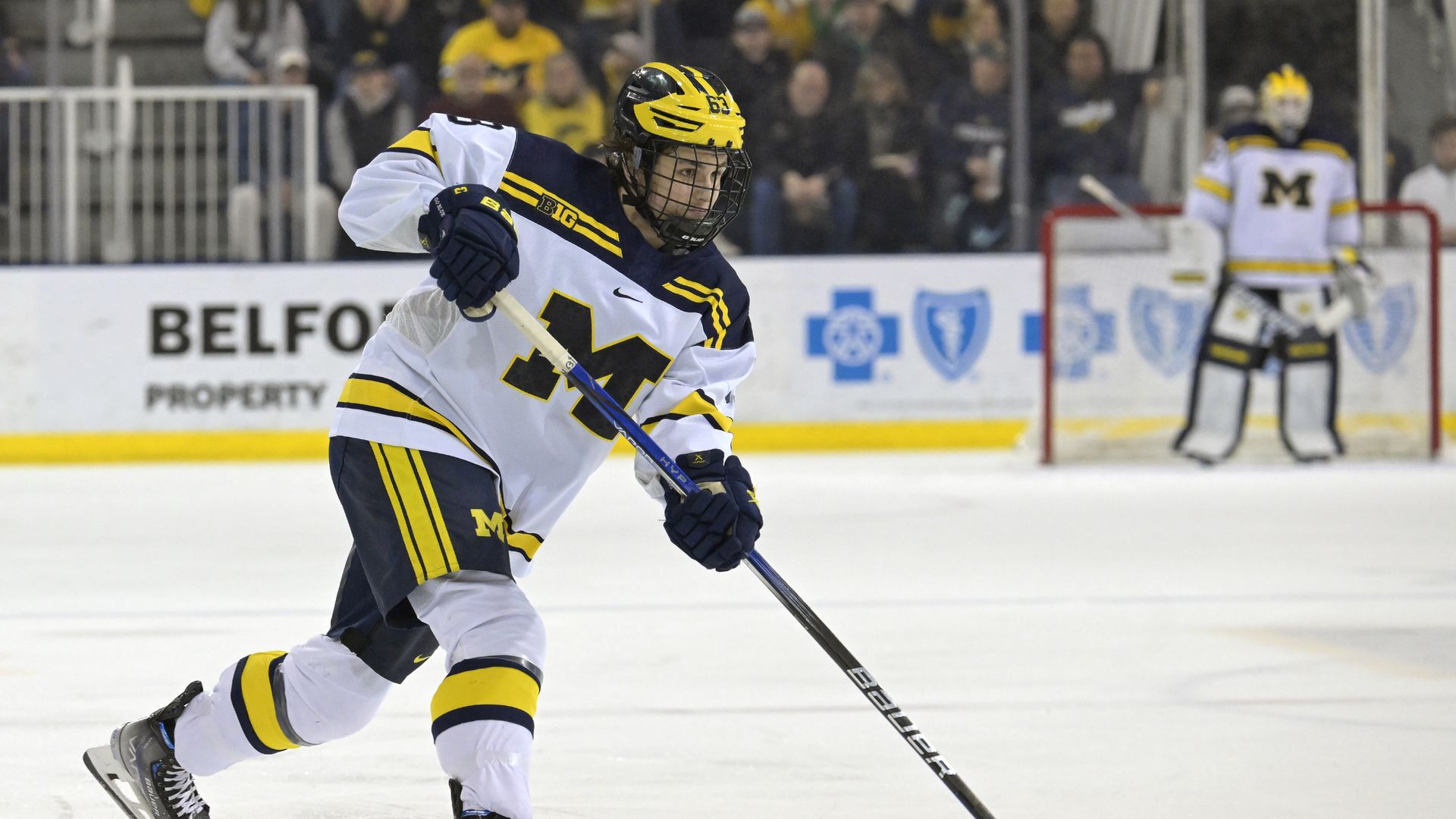 Michigan Wolverines defenseman Luca Fantilli takes a shot on goal against Notre Dame at Yost Ice Arena in Ann Arbor. (Photo by Nick Wosika/Icon Sportswire via Getty Images)